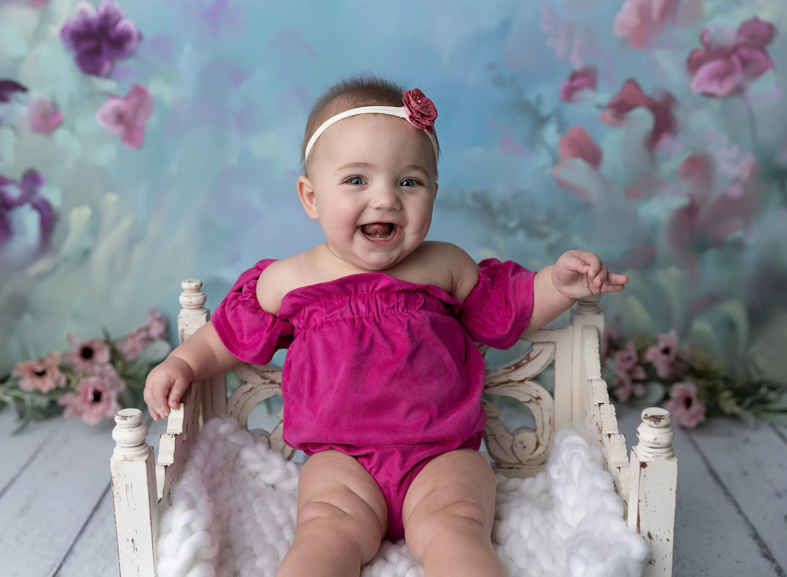 Six month girl in pink outfit with props in Port Charlotte FL