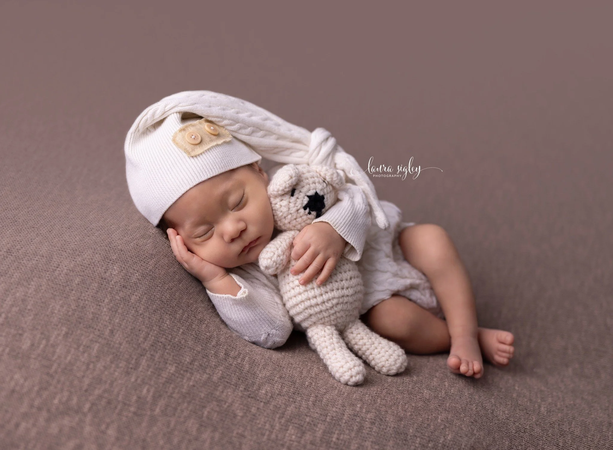 This precious little guy was born 8 weeks early and was 6 weeks old for his session. He wasn't even supposed to be born yet.  He is so loved and absolutely perfect.