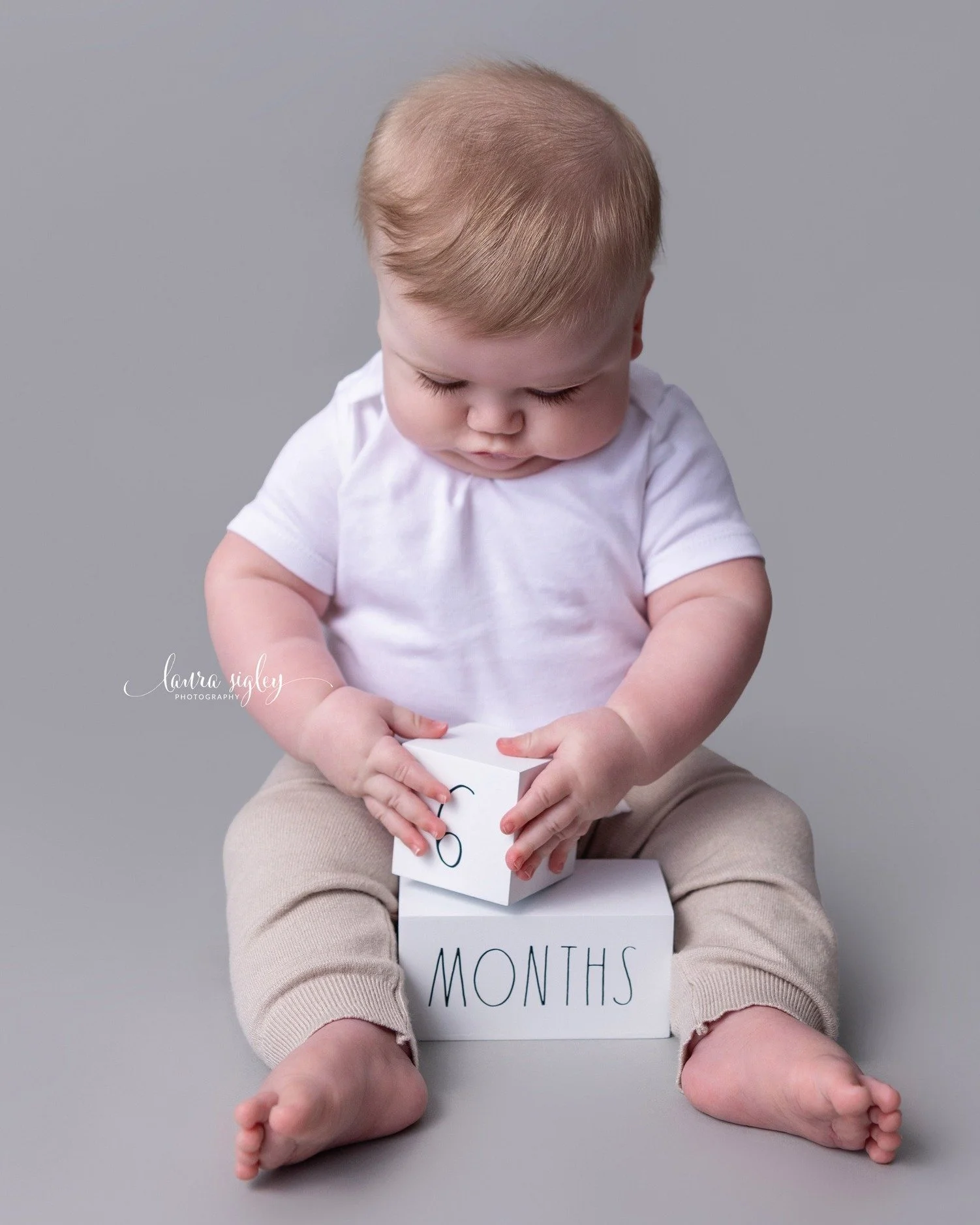 Warning: These cheeks may cause uncontrollable smiling. 😍
Six months never looked this cute!