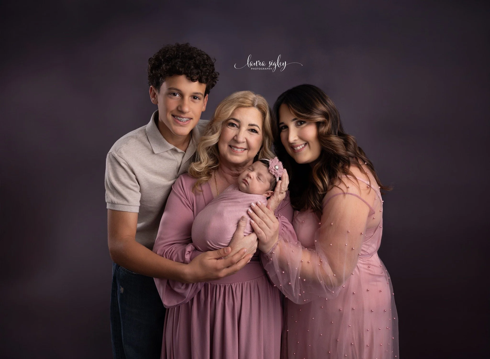 Three generations. One beautiful story. 🤍

There is something incredibly special about capturing a grandmother holding the newest member of the family while standing beside the daughter she once held the same way. Now another little life has joined 