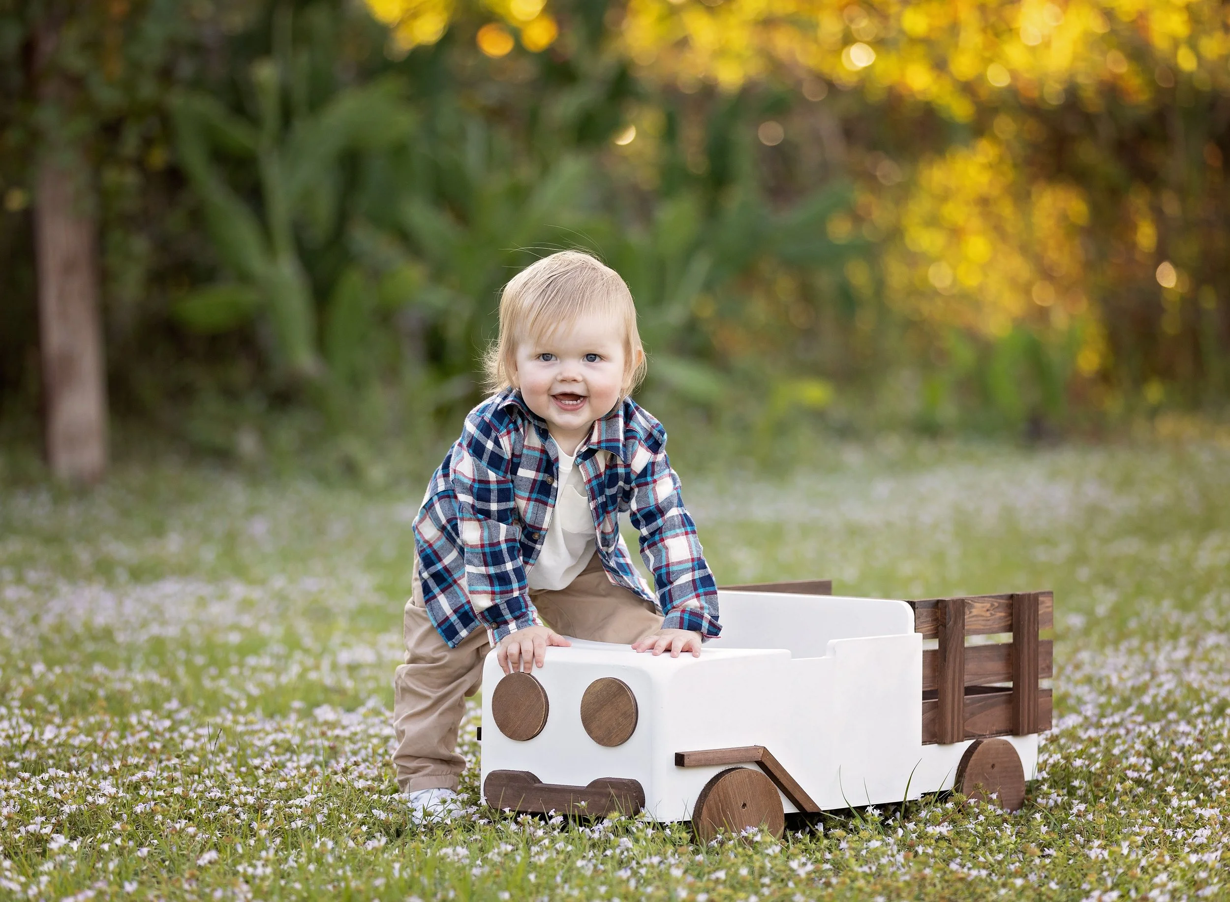Two year old boy in park with a truck prop North Port FL
