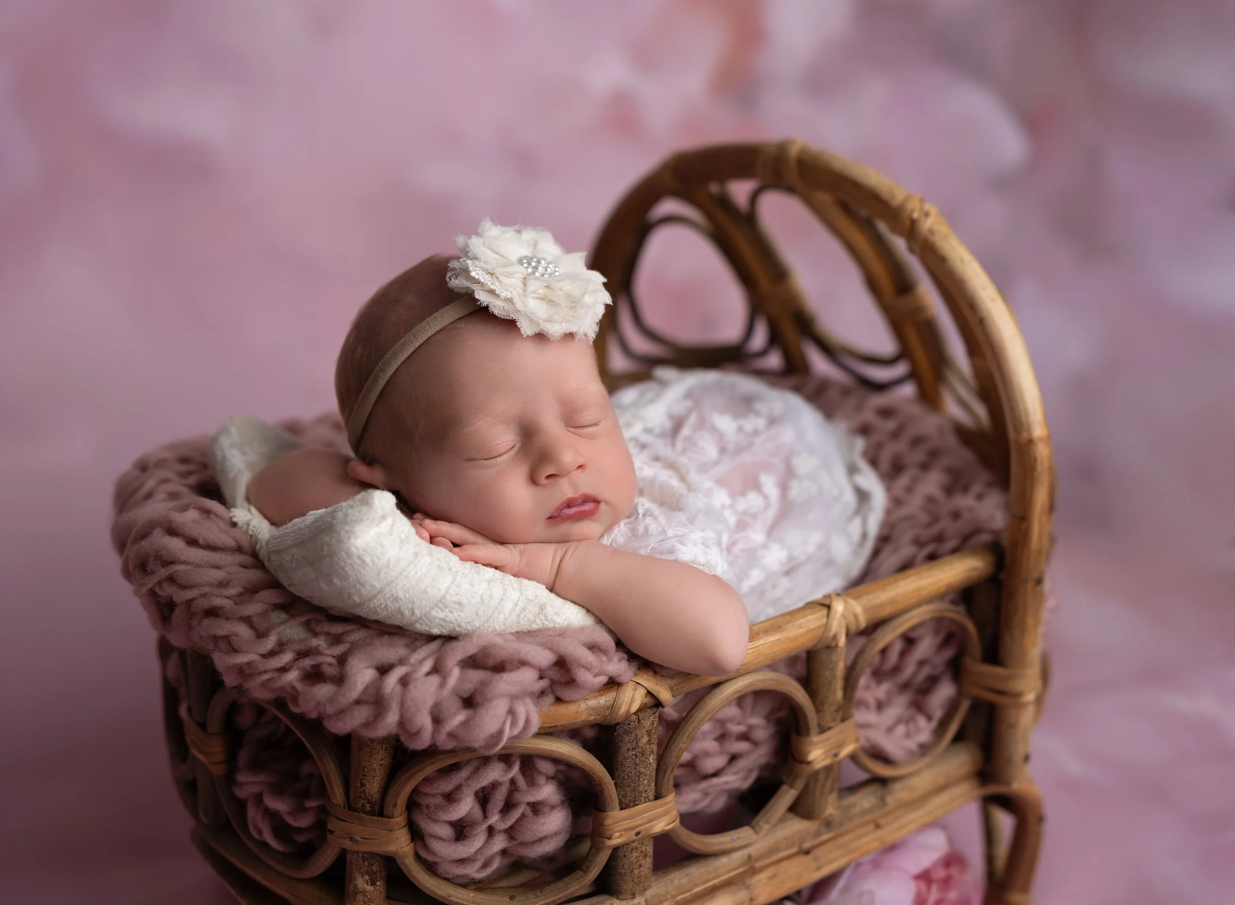 Newborn girl in pink in photo studio Port Charlotte FL