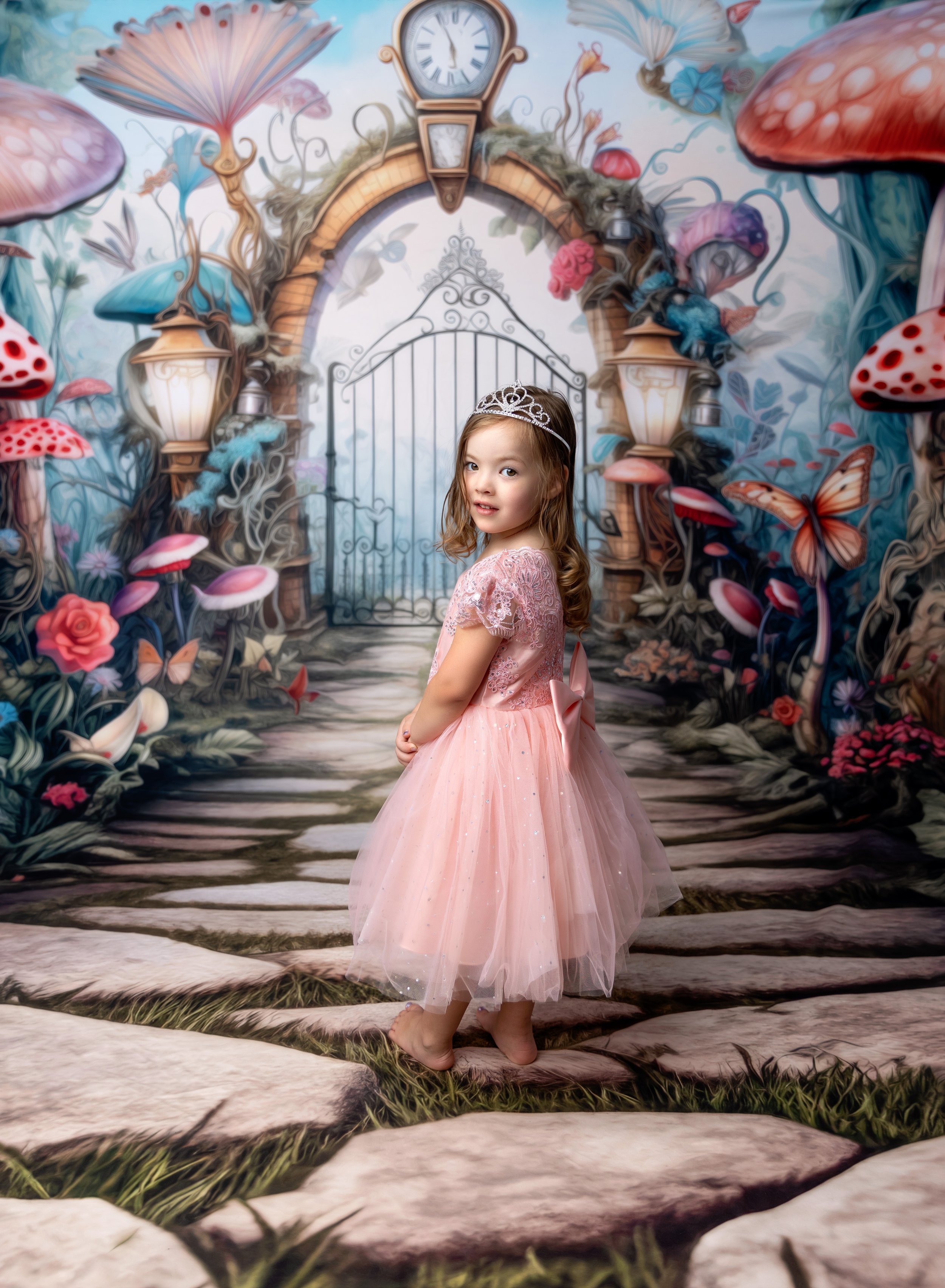 Four year old girl in pink dress on Wonderland backdrop in photo studio North Port FL