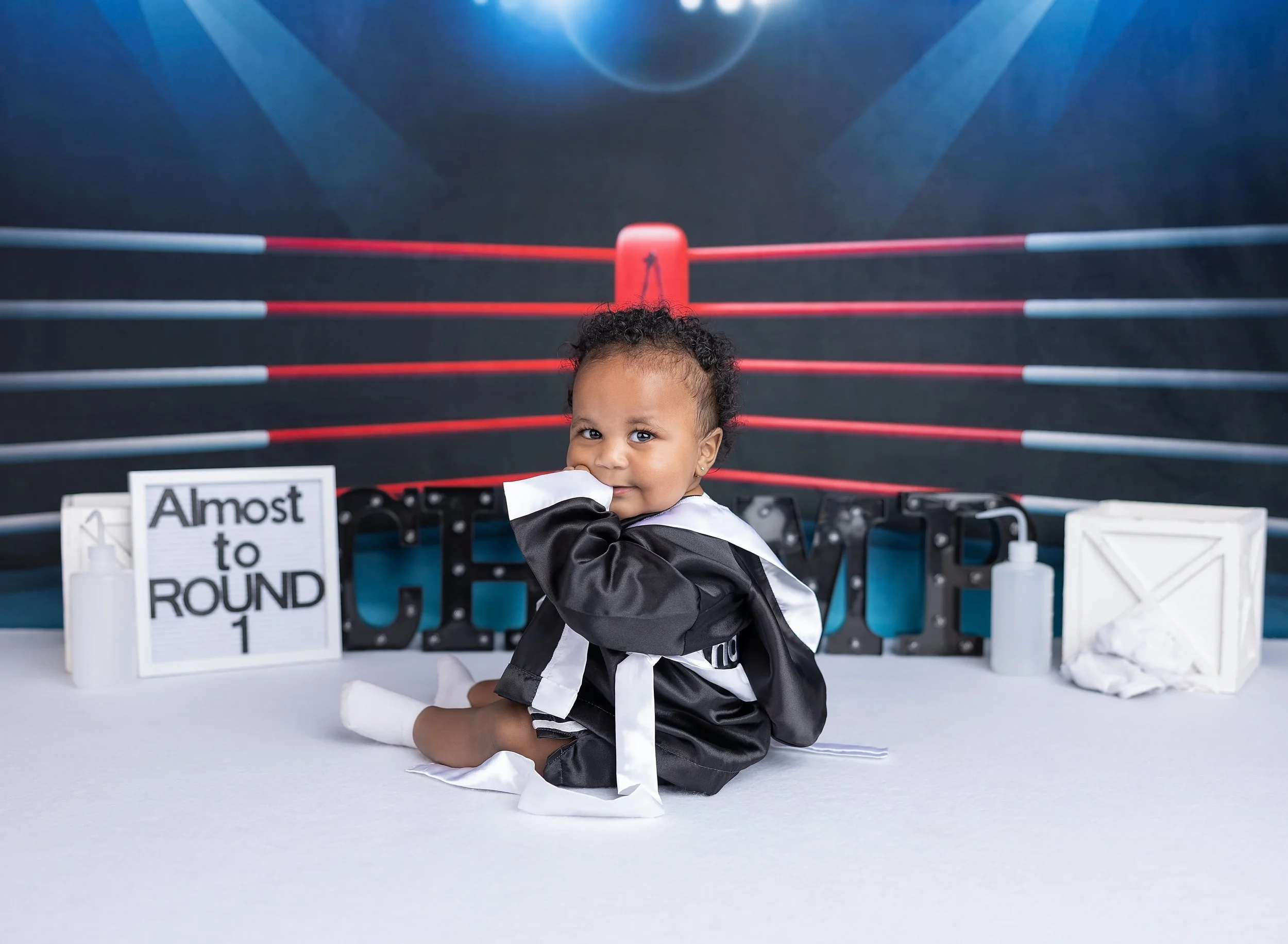 Six month baby boy in boxing ring in photo studio North Port, FL