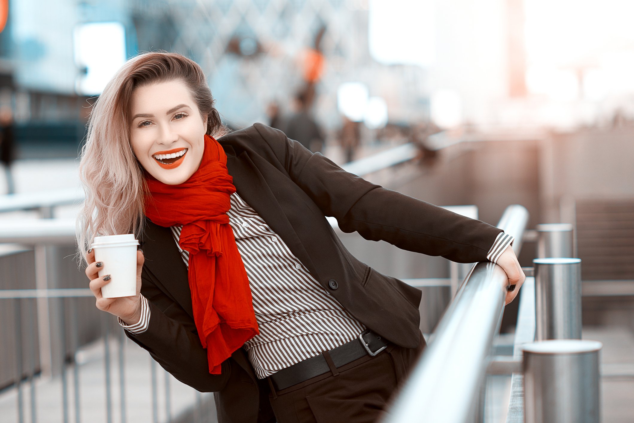 Energized woman with coffee following individual therapy session