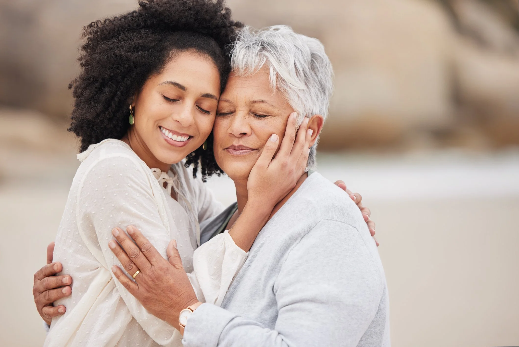 Mother and Daughter on Beach after working with Dr Jan Anderson for Estrangement Coaching