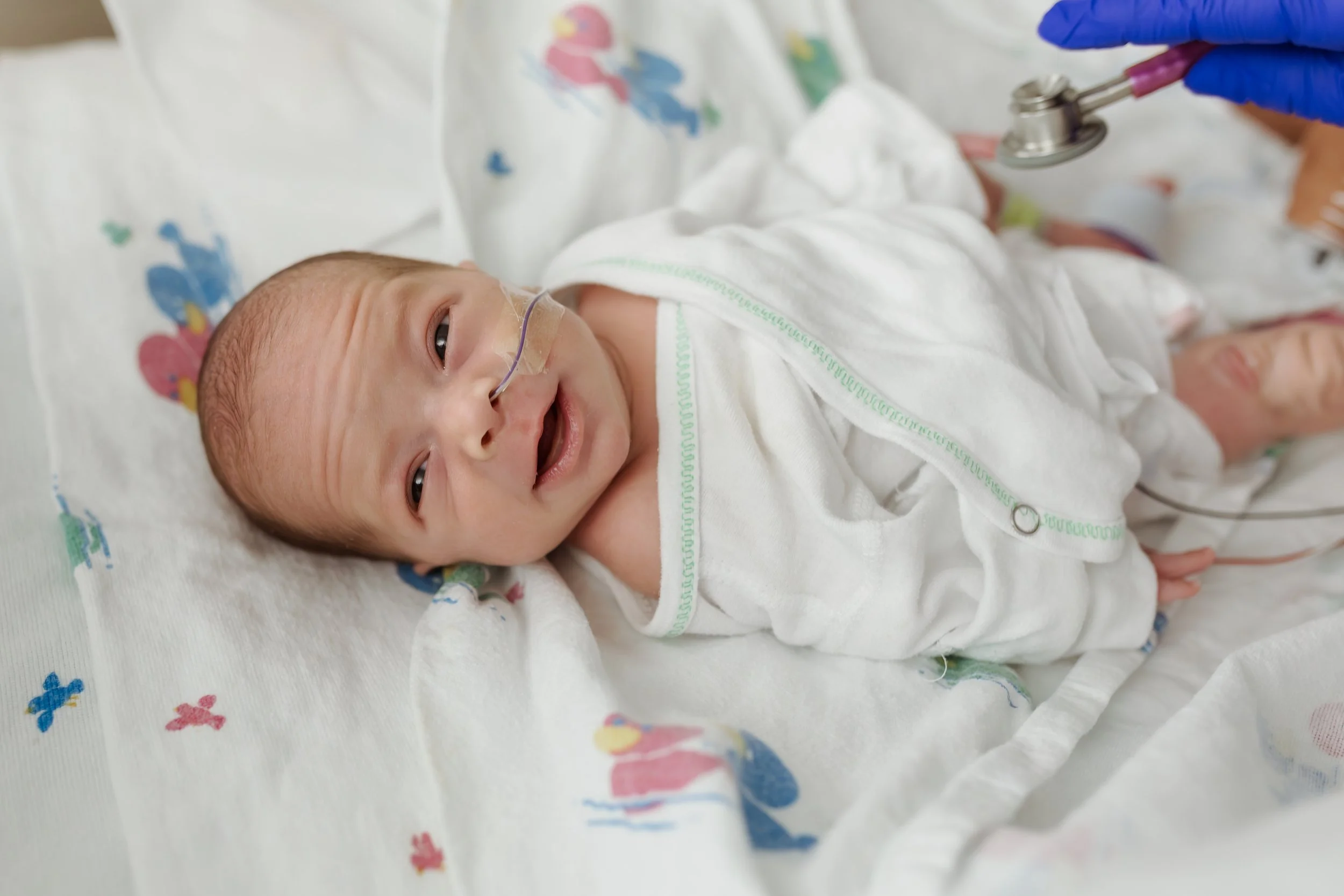 Authentic NICU newborn session capturing real moments, Southern New Hampshire lifestyle photographer.