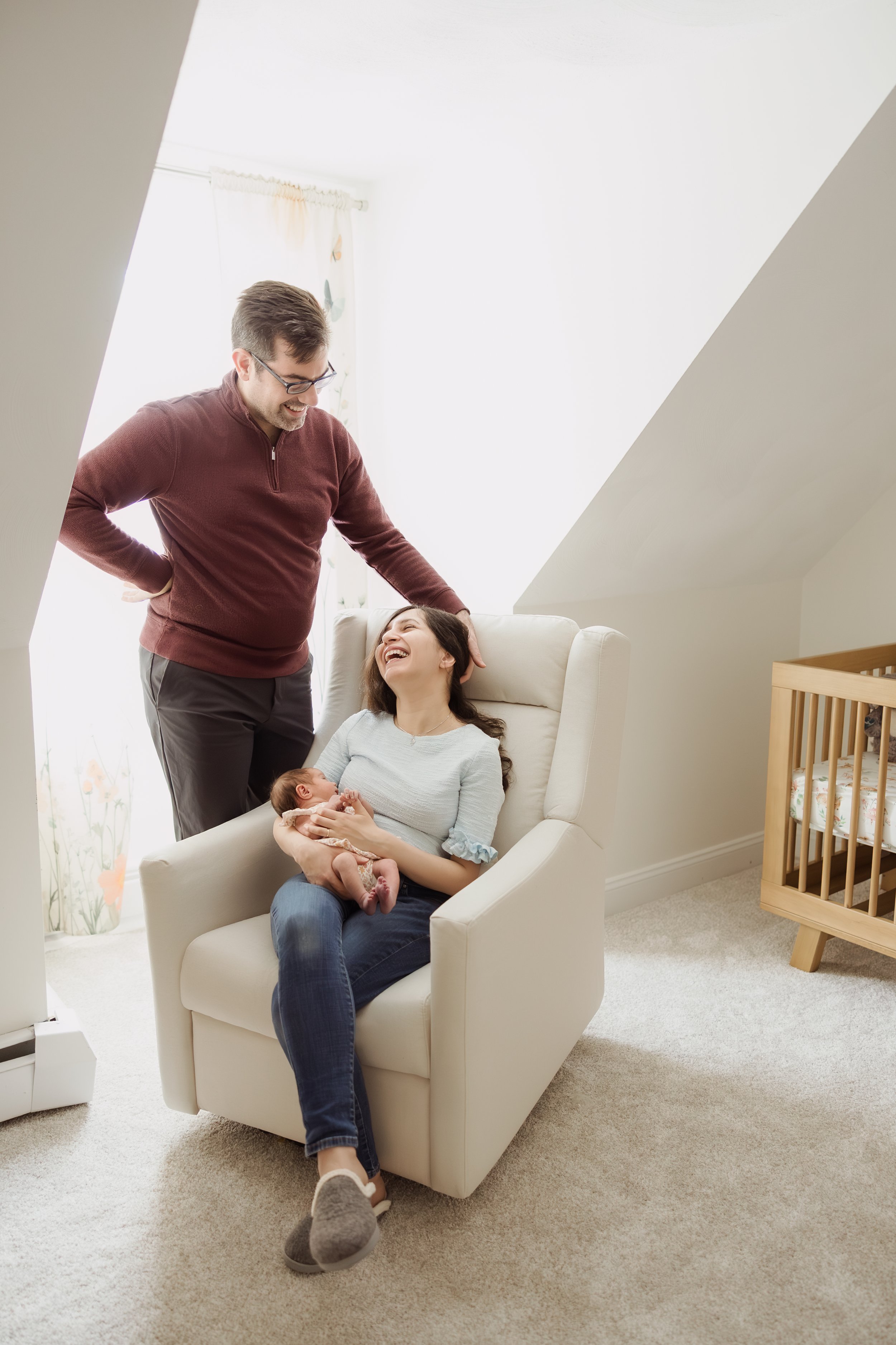  Candid moments with baby captured during relaxed, in-home photo session. 