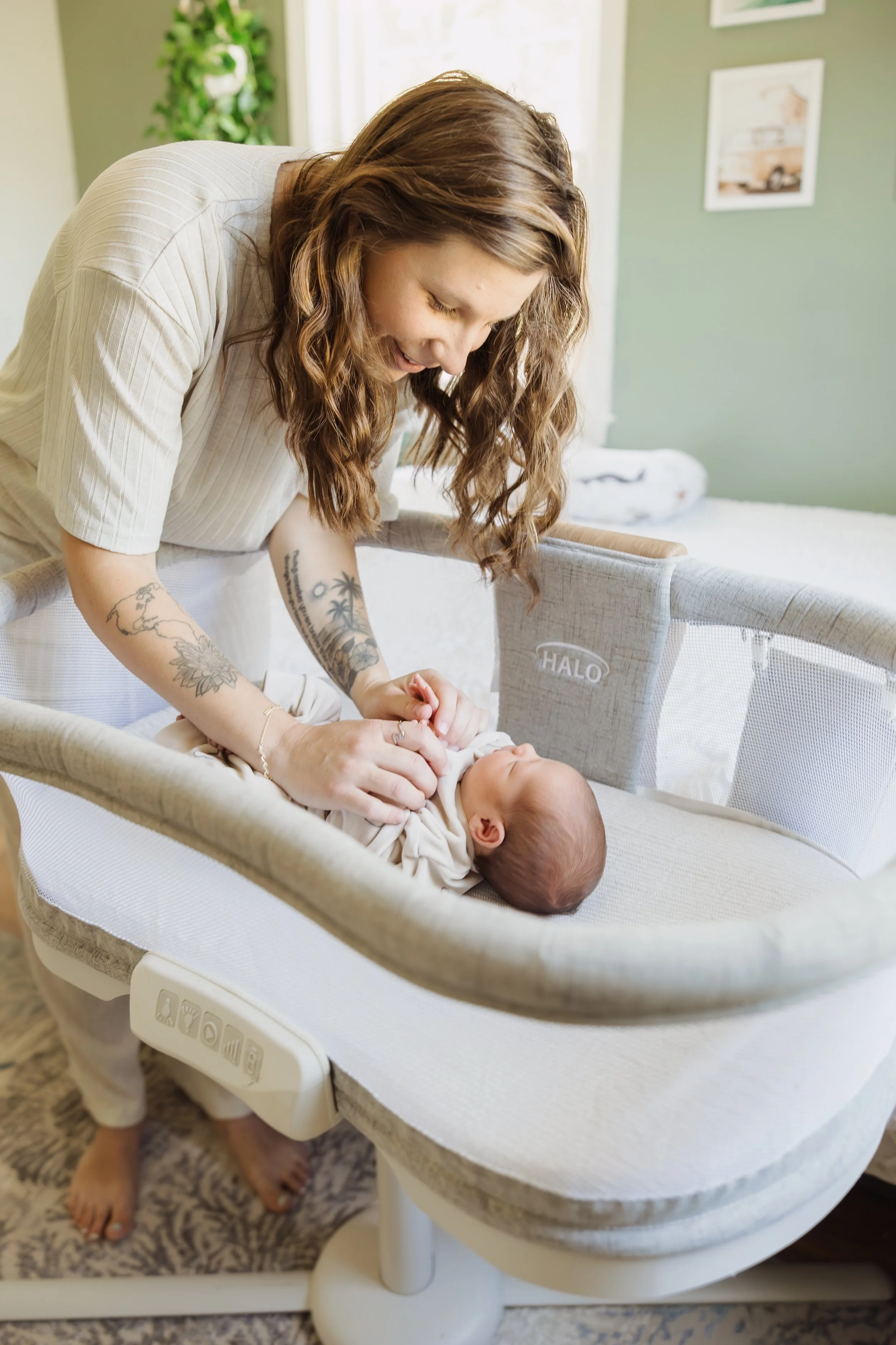 Lifestyle newborn photographer in Northern Massachusetts working with a first-time mom at home.