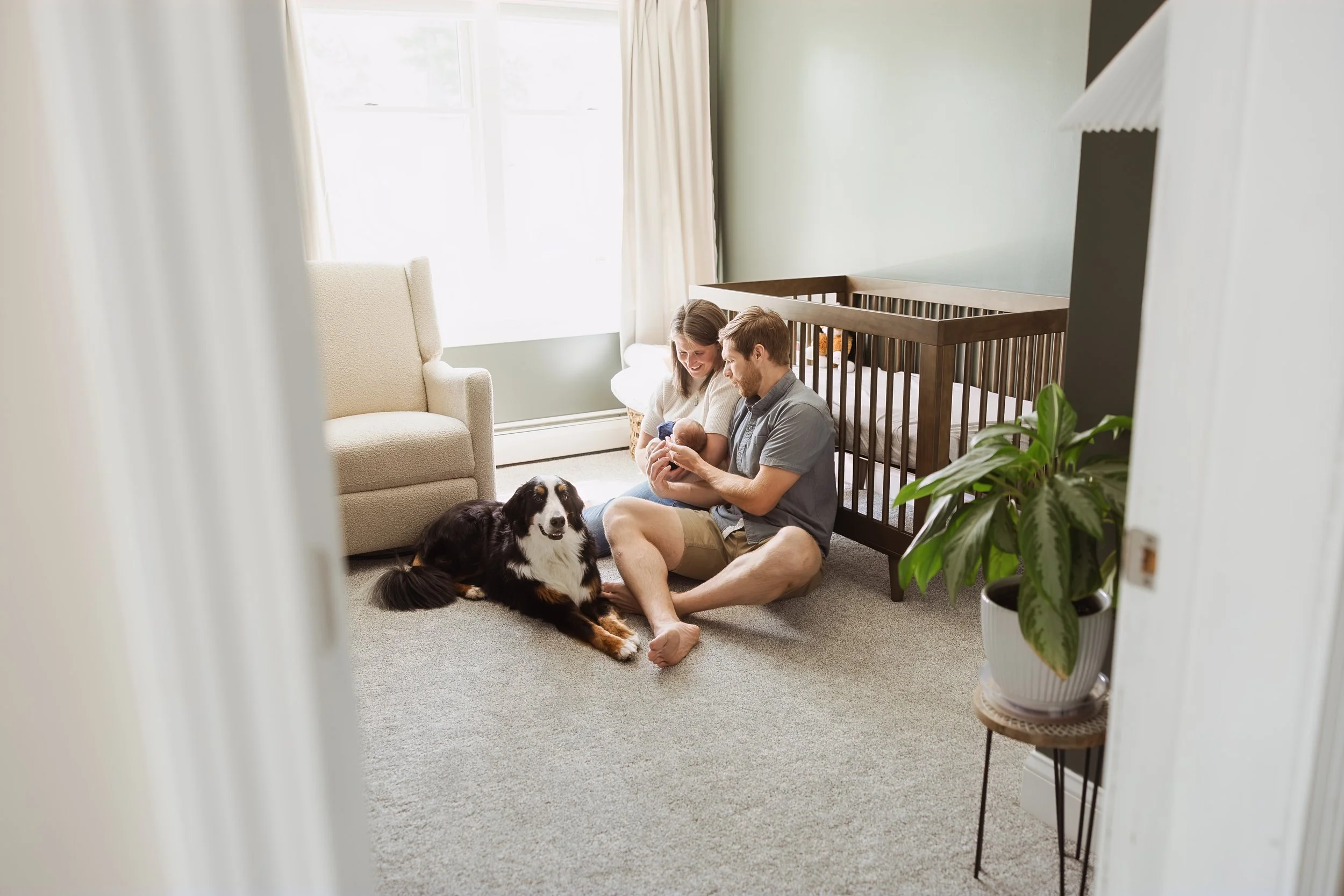 Southern New Hampshire in-home newborn lifestyle photography capturing a real family moment in the early days of parenthood.