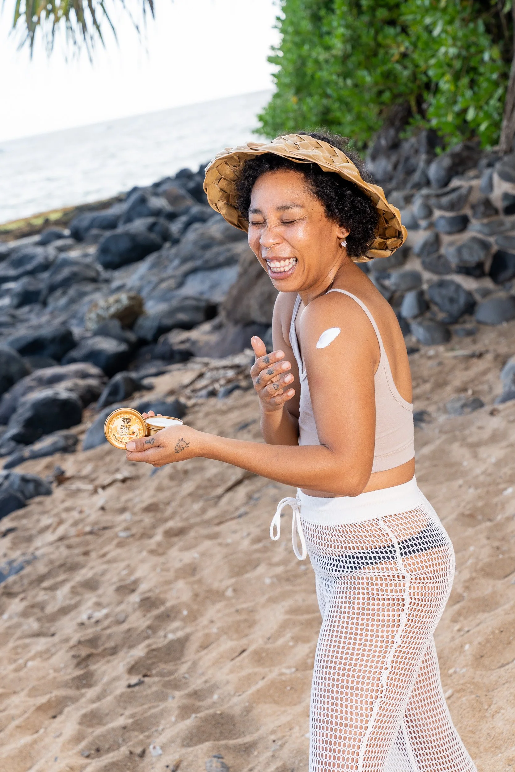 olove-clean-skincare-lifestyle-campaign-beach-portrait-sunscreen-tin-ashgerlcreative-01.jpg