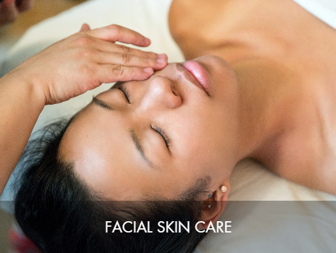 A woman receiving facial skin care treatment with her eyes closed, lying on her back. The text overlay says 'Facial Skin Care'.