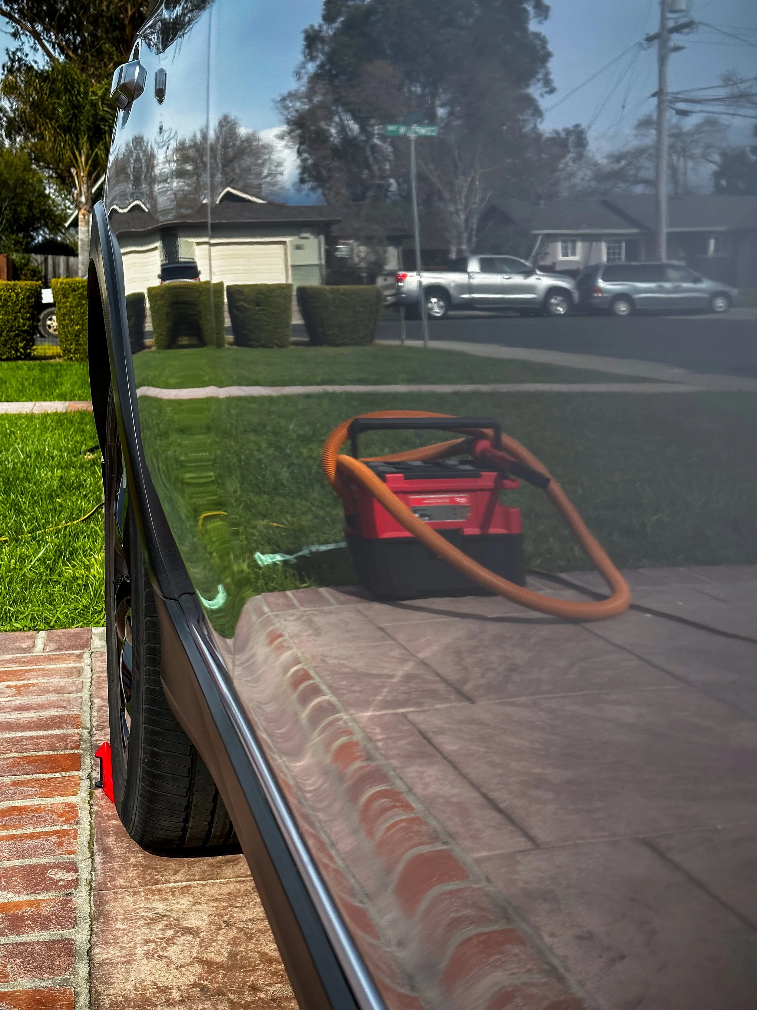 Polished and ceramic-coated car panel from mobile detailing service in Santa Cruz