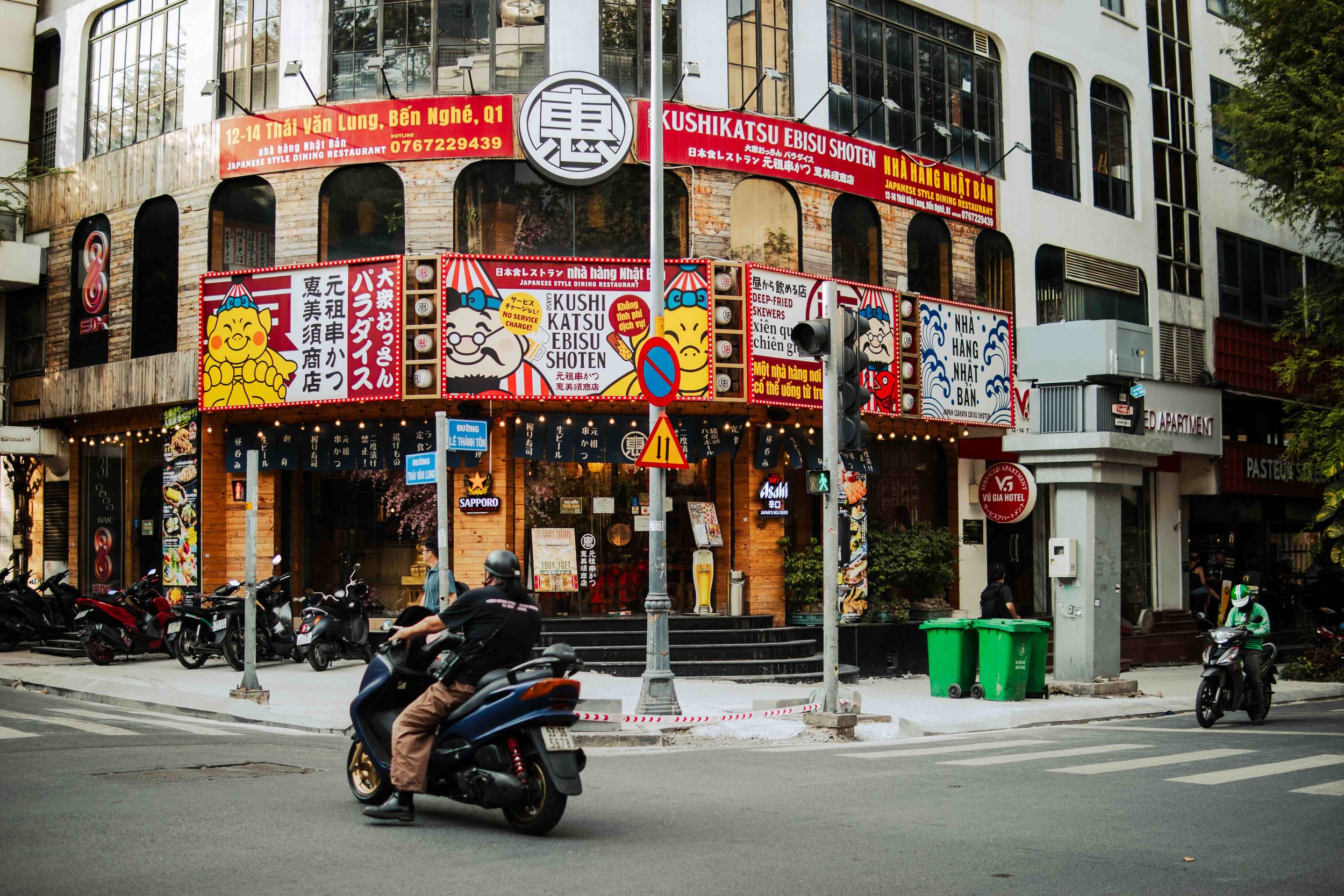 Person sitting on the sand and drawing a horse track from a worksheet titled 'The Ancient Art of Tracking' with instructions and illustrations.