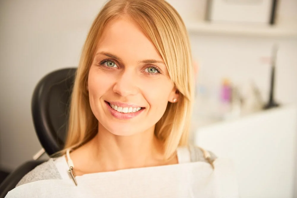 dentique_bleaching_muenchen_smiling_woman.jpg