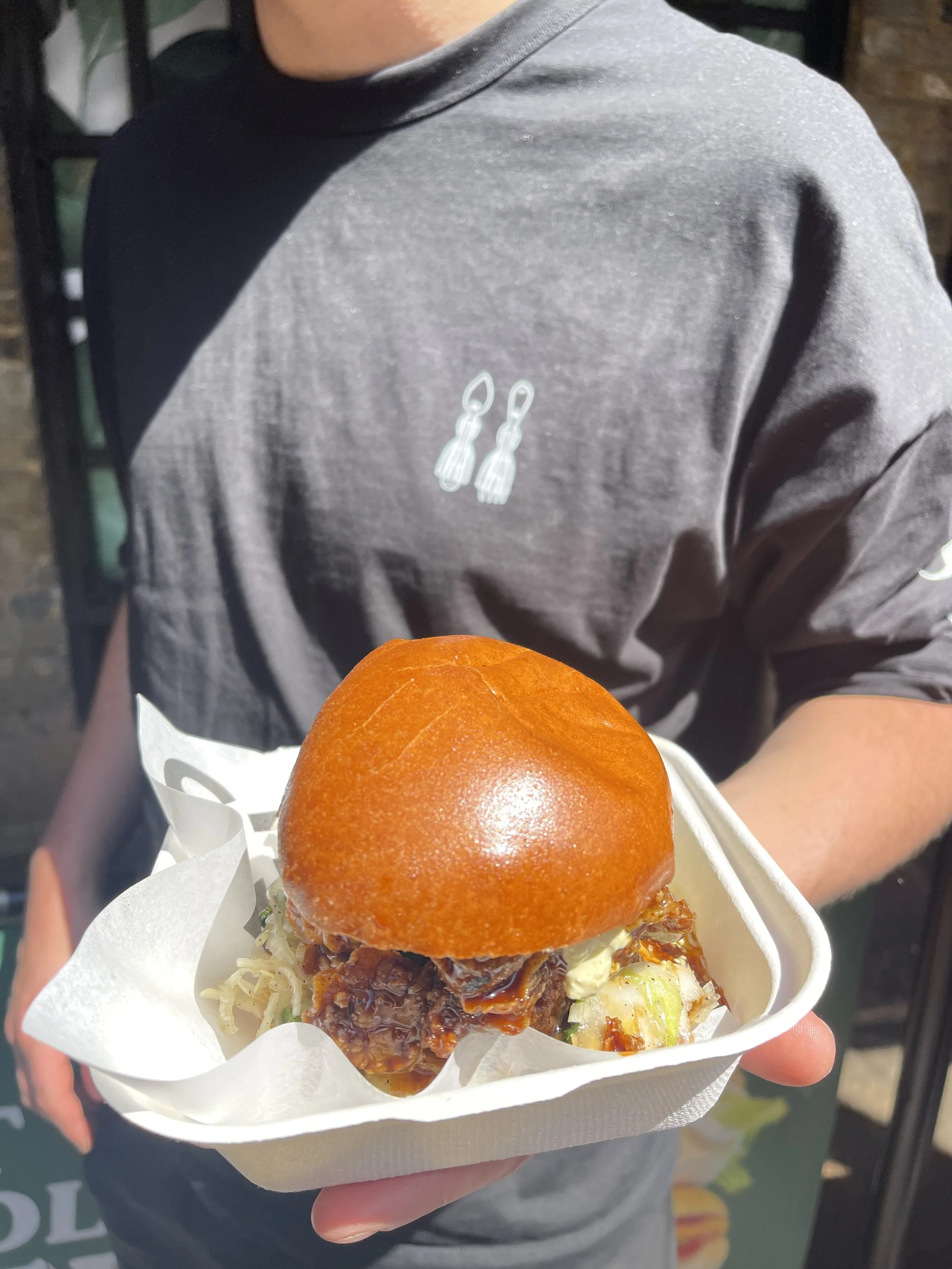 Bill or Beak burger in Johnny's hand