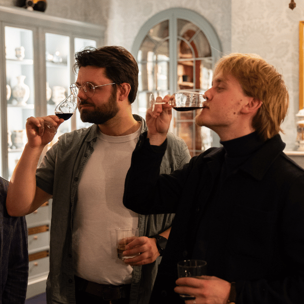 Guests enjoying wine tasting at an event at Apothecaries' Hall