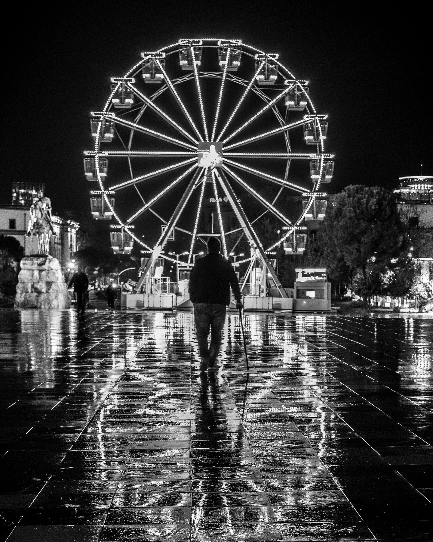 Every reflection is a memory the pavement refuses to forget. #tirana #albania #fujixseries #fujifilmphotography #fujifilm #fujifilmphotography #bandw #monochromatic #streetphotography #streetphotographer #bwphotography #bwphoto #monochromephotography