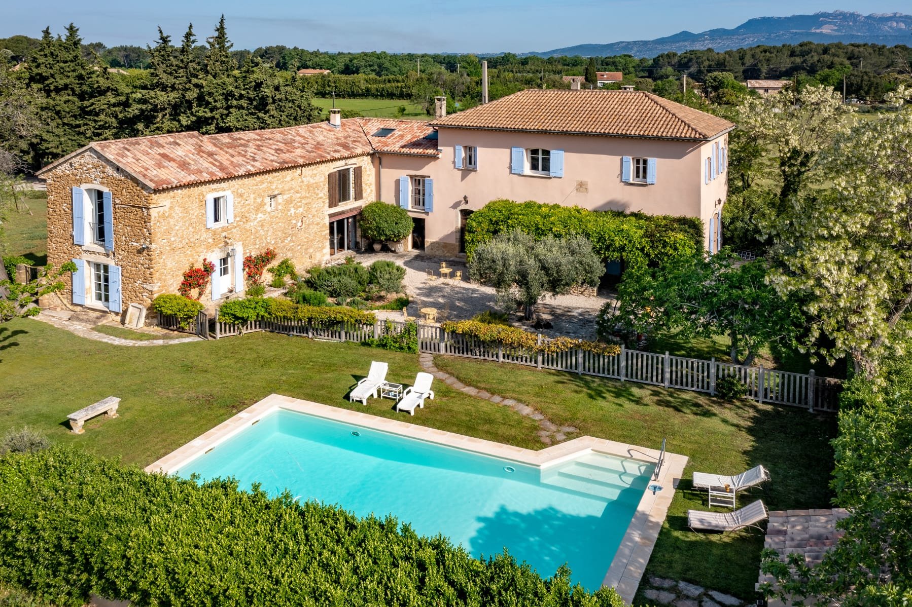 View of pool, courtyard and house