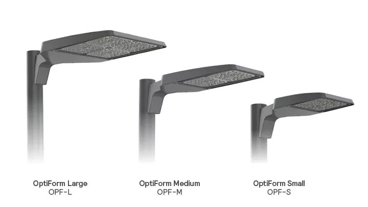Three Gardco OptiForm LED area luminaires in different sizes: large, medium, and small, shown mounted on poles.