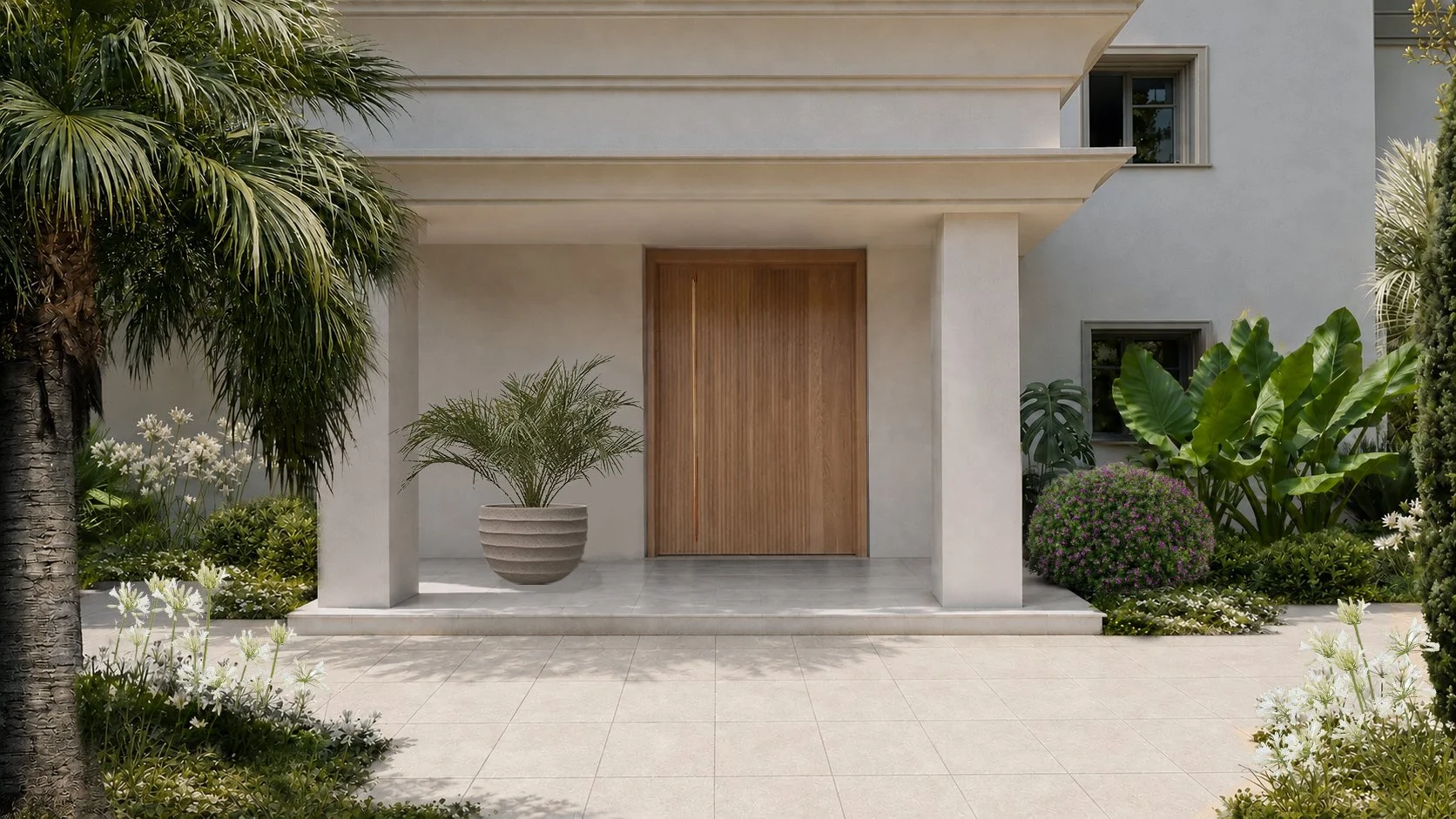Contemporary front entrance garden Mallorca with palm tree and tropical plants