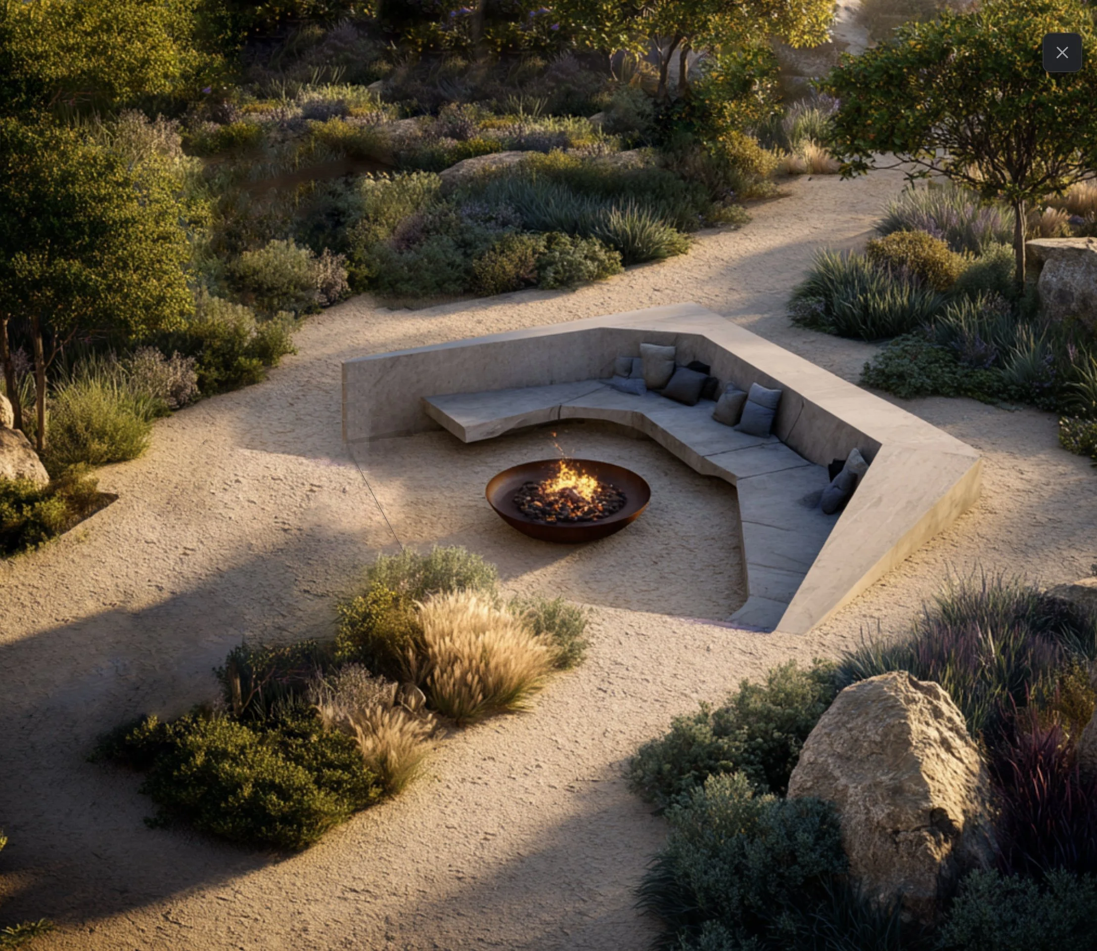 Outdoor fire pit with bench seating wall and Mediterranean landscape