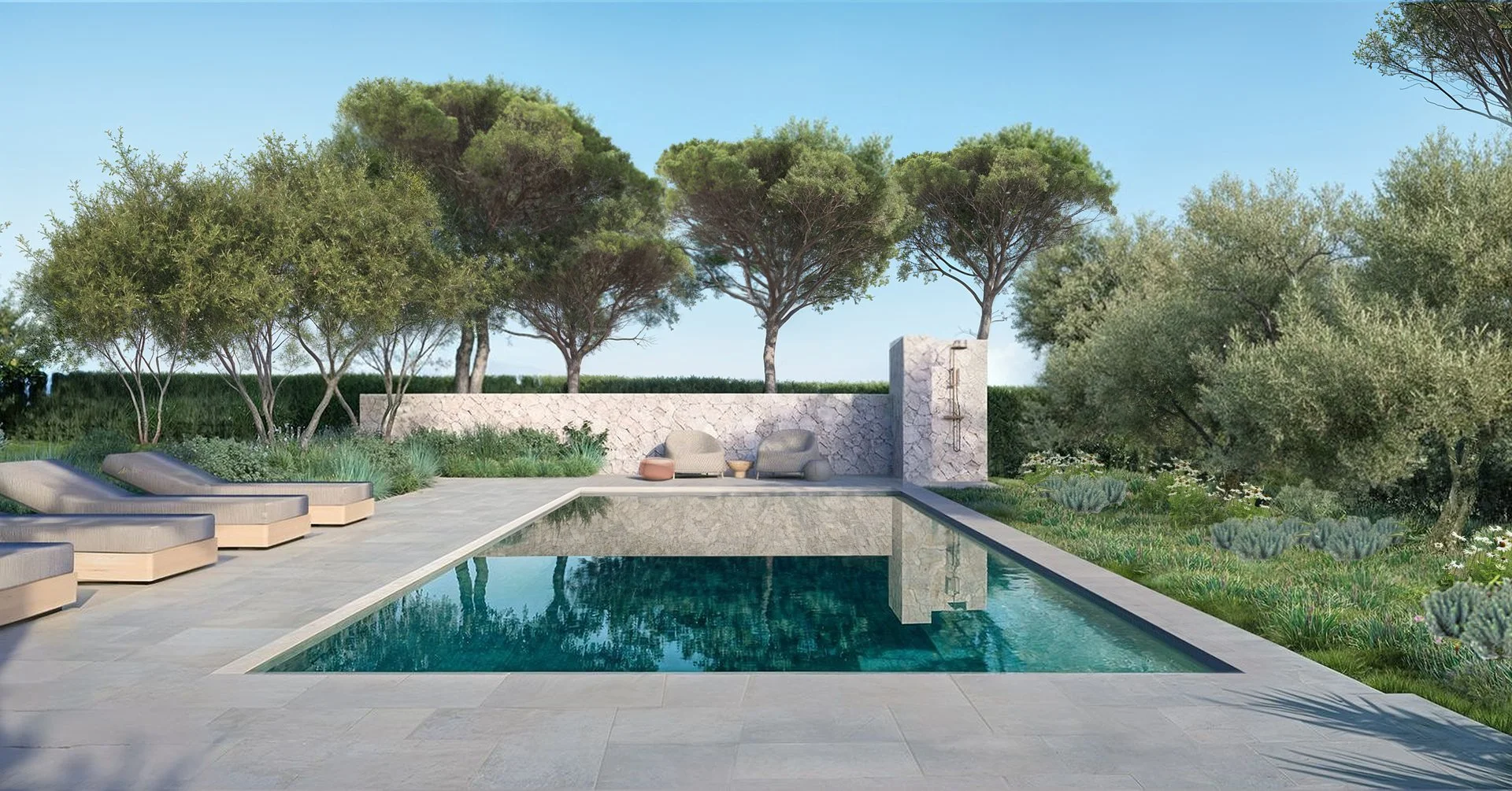 Pool renovation with stone wall and sun loungers