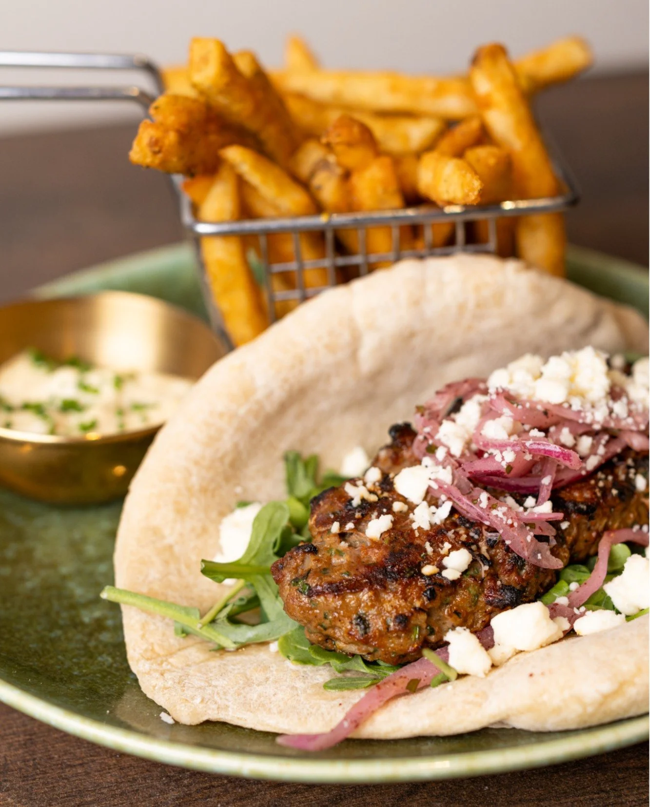 Some things deserve more attention&hellip; This is one.

Lamb Gyro | lamb kefta, feta, confit tomato, sumac onion, arugula, harissa, served with za&rsquo;atar fries