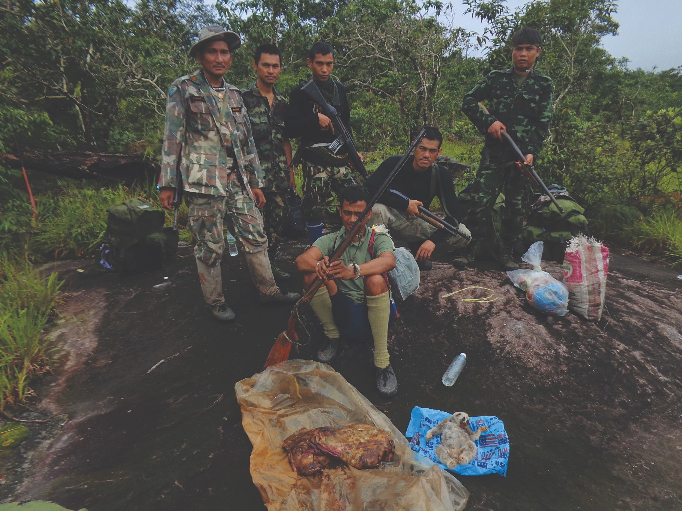   Thap Lan rangers with confiscated rifles and poached animal remains. It takes sophisticated technology and equipment to protect our parks, but one antiquated rifle can further threaten an endangered species.  