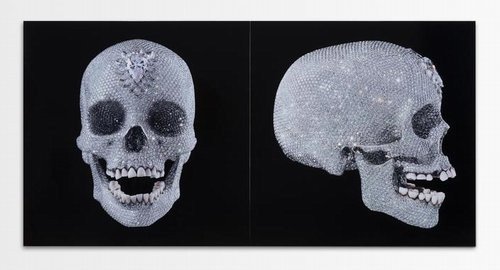 Two views of a human skull covered in diamonds, shown from the front and in profile against a black background.