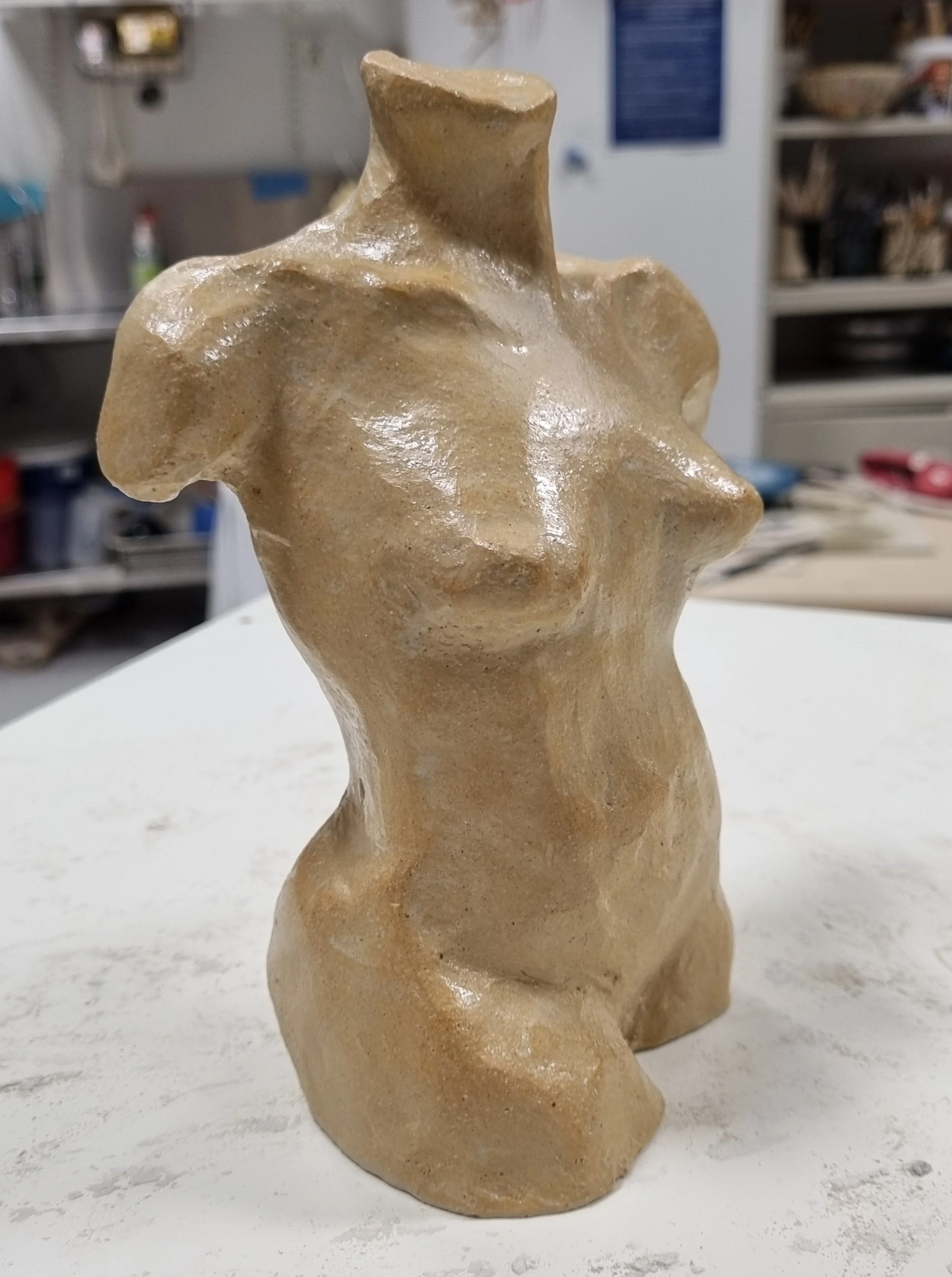 A ceramic figurative sculpture modelled from the nude.