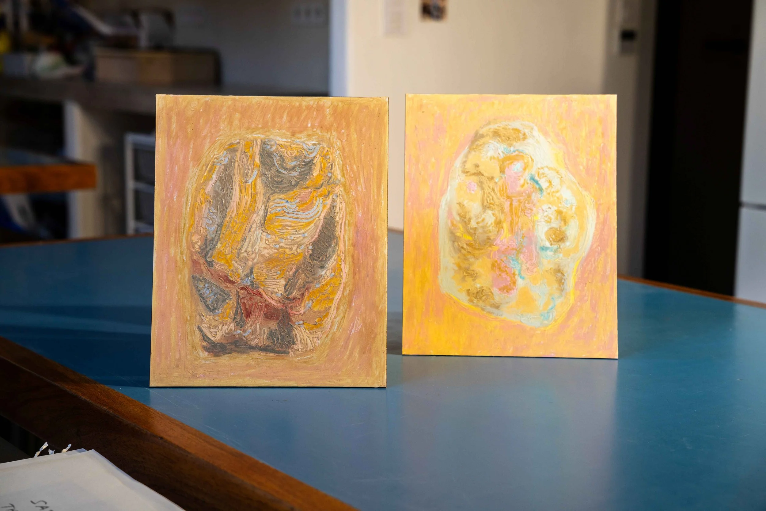 Finnish artist Satu Metsola's two abstract oil stick paintings. Based on the shiny rocks and stones in the Greek island Andros