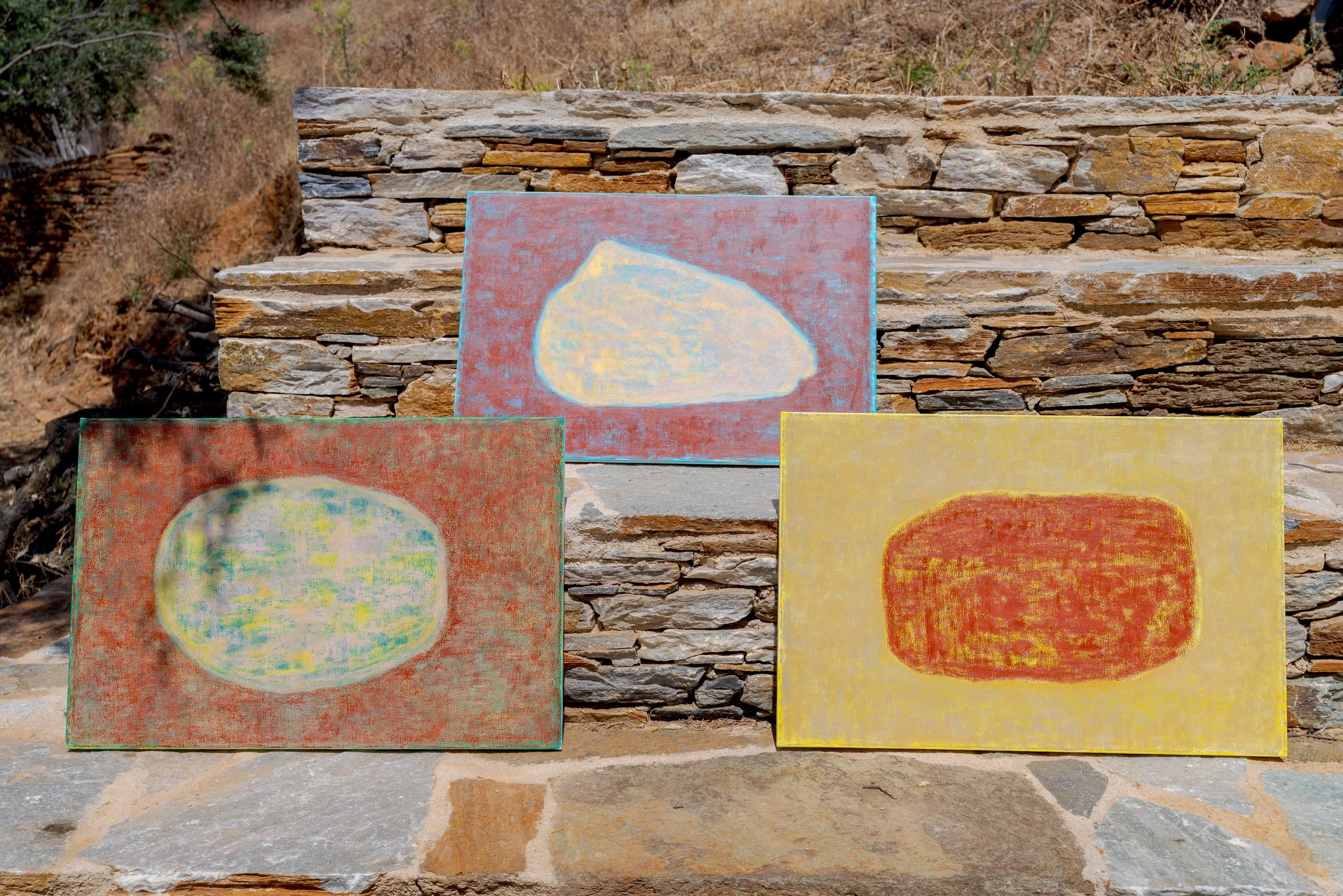 Finnish Artist Satu Metsola's three abstract oil stick paintings on display outdoors in the Greek island Andros