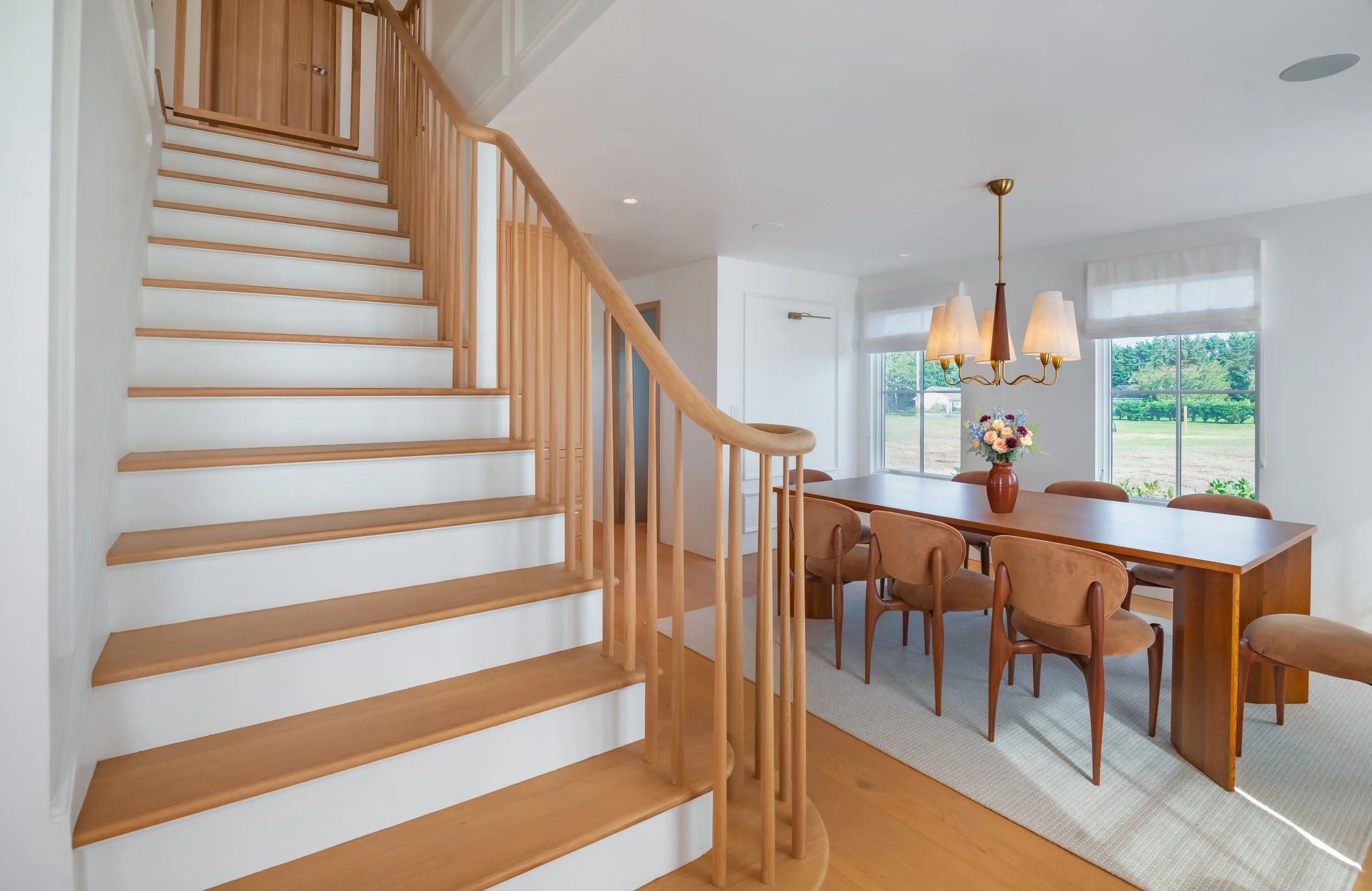 05-north-fork-gut-renovation-curved-white-oak-staircase.jpg