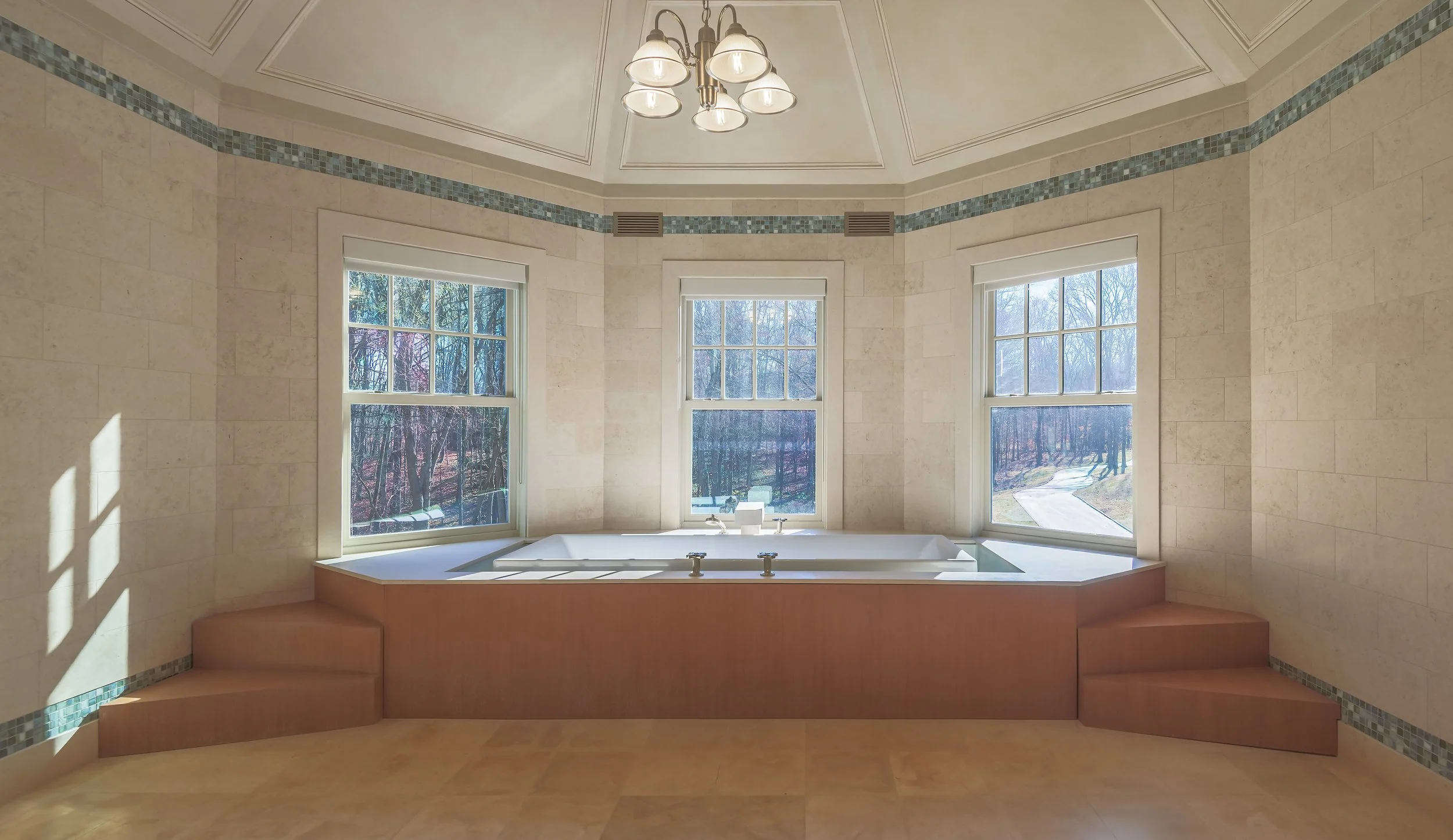Custom octagonal master bath with soaking tub & mosaic tile by Palma Design — luxury architectural photography for builders &
   designers in New York.