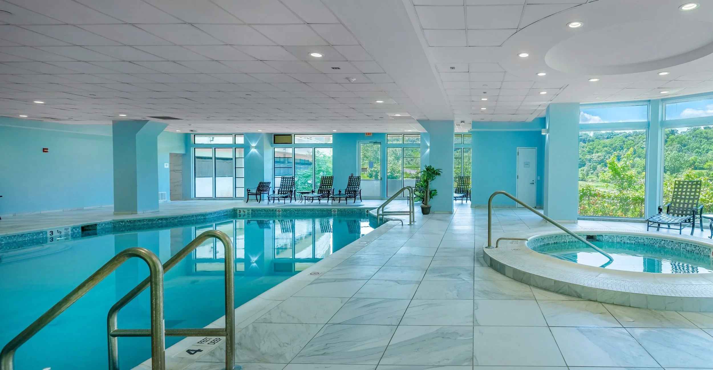 the-addison-indoor-pool-spa-amenity-architectural-photography.jpg
