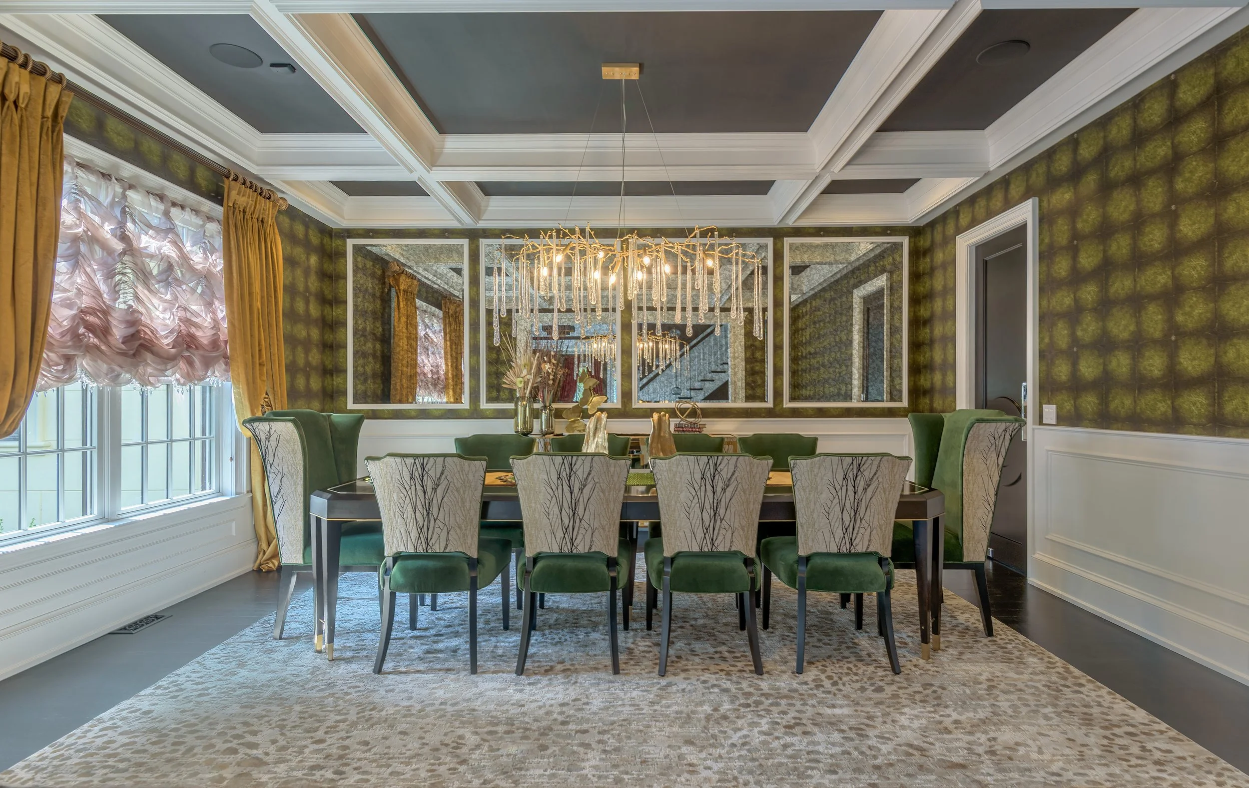 Architectural interior photography of a luxury dining room featuring coffered ceiling, mirrored wall panels, upscale furniture, and sophisticated residential design.”