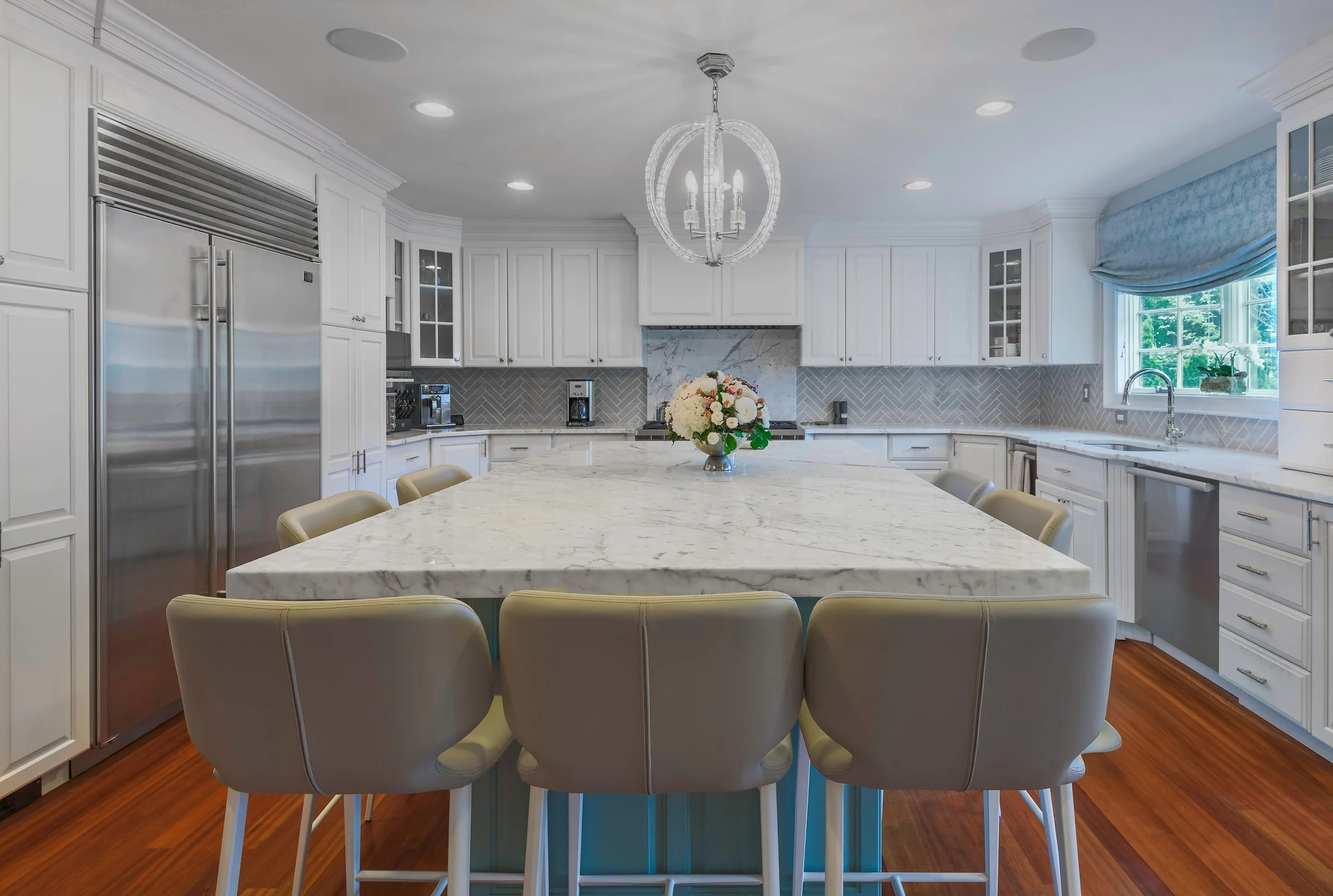 luxury-white-kitchen-marble-island-stainless-appliances.jpg