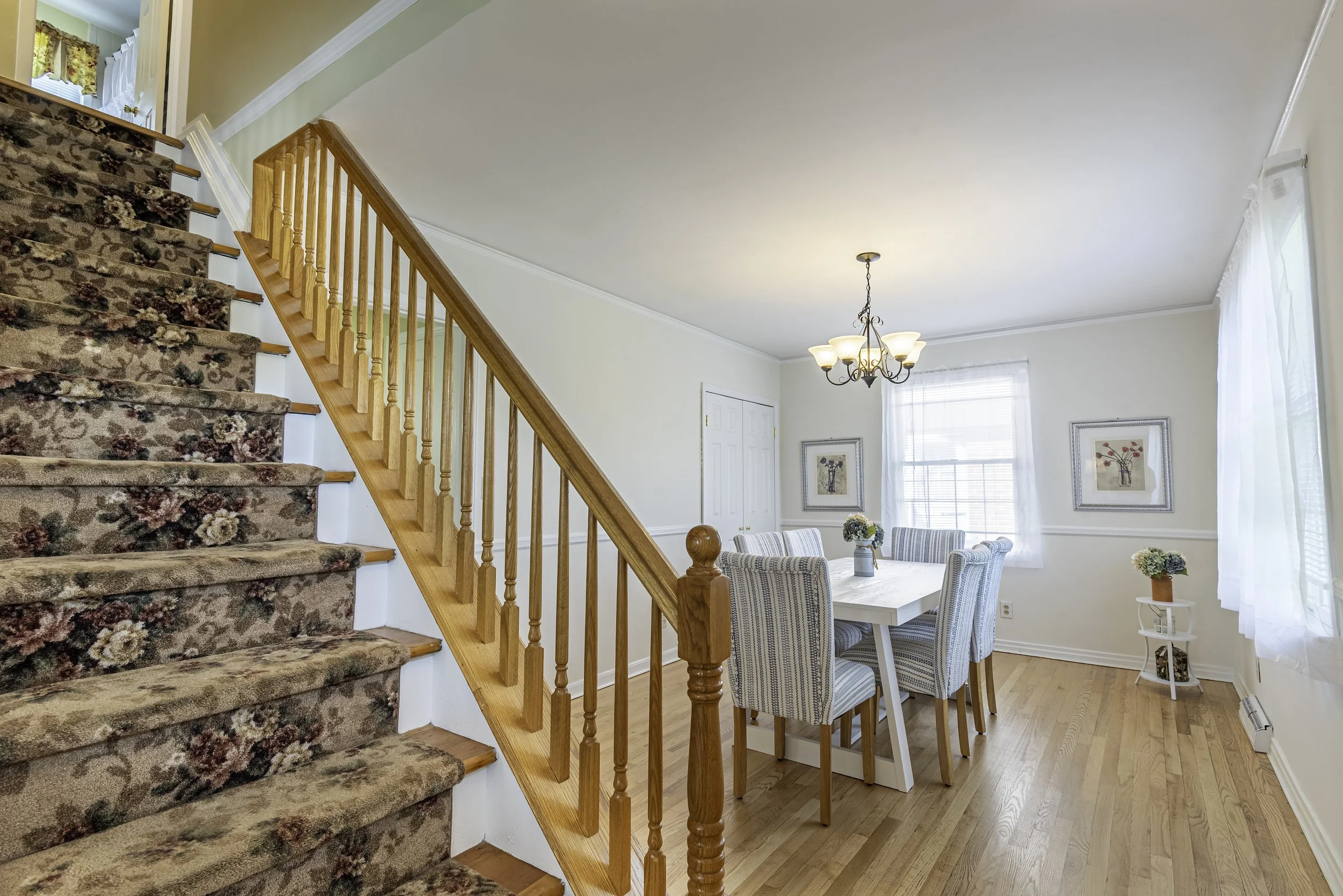 dining-room-open-concept-with-staircase-view.jpg