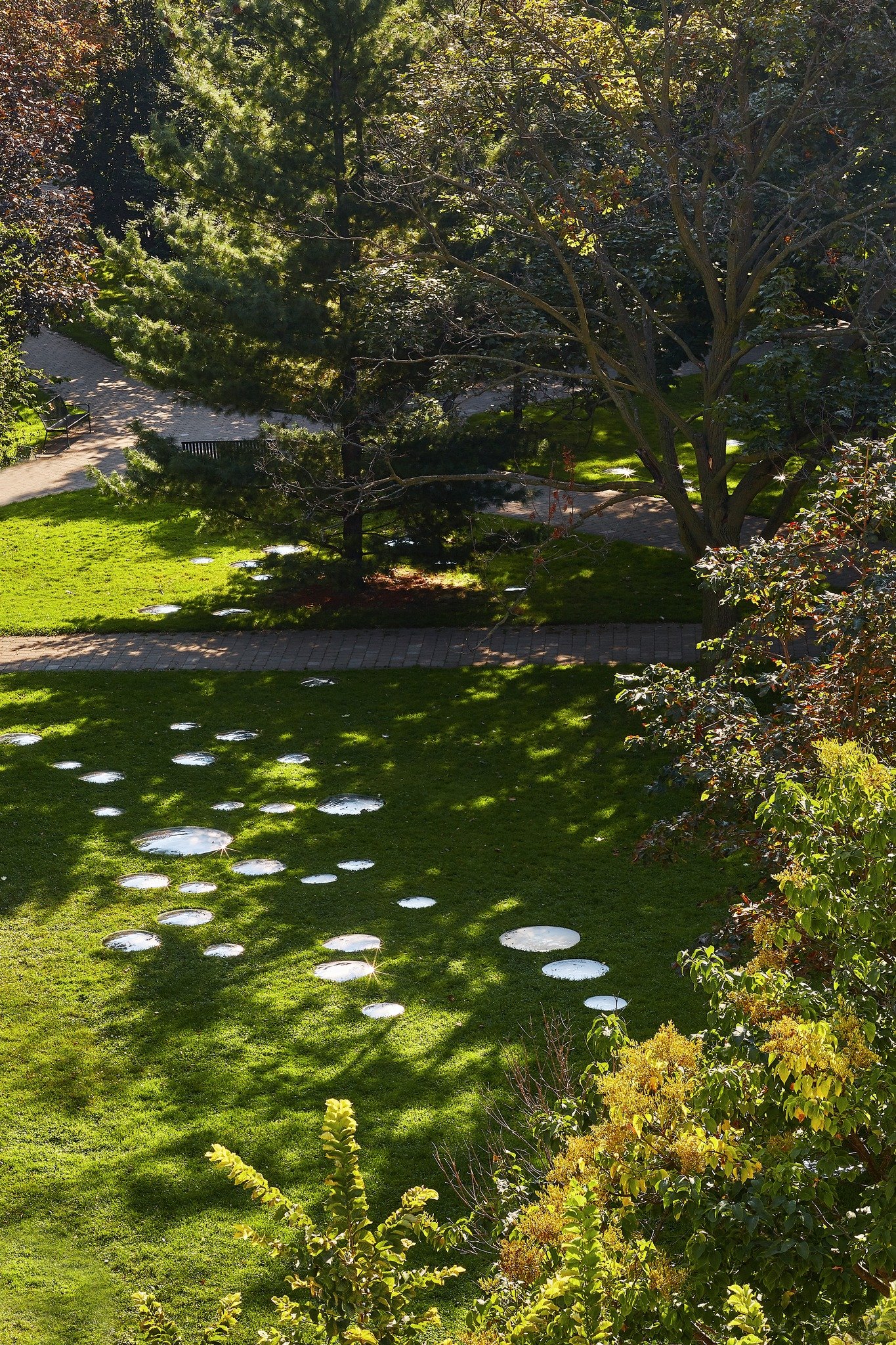Wa Wa &mdash; a winning installation for the University of Toronto Art Museum competition.

Installed within the Sir Daniel Wilson Quad at the St. George Campus, the project transformed the courtyard using over 130 convex mirrors that reflected the s