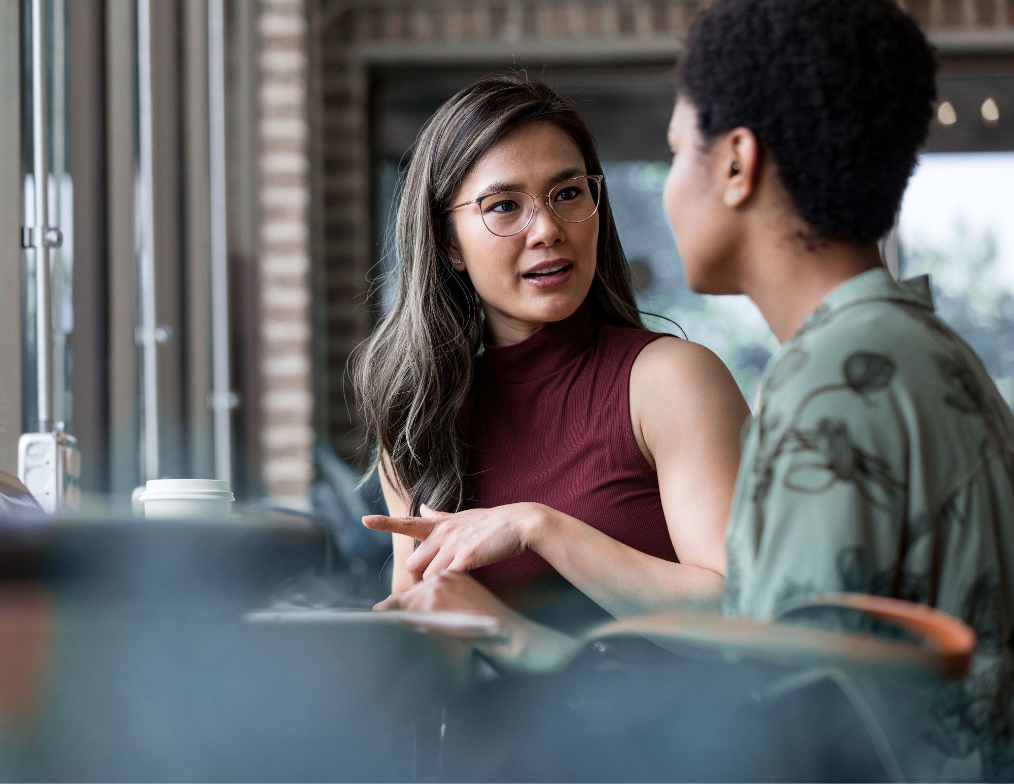 Two In Conversation Over Coffee