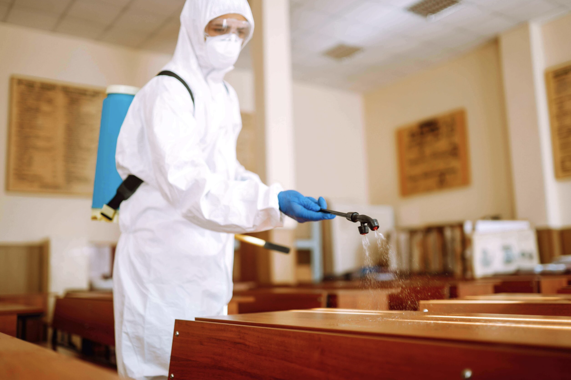 Oranssi technician working on a roof project