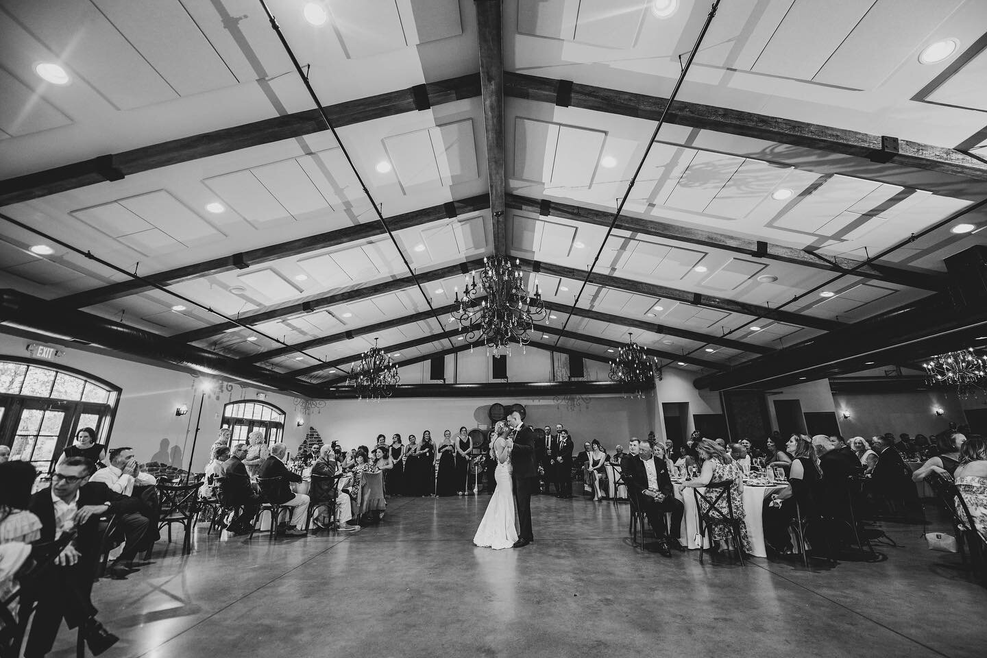 First dance in a timeless moment at the Chianti Room, where memories are etched in elegance. 🖤✨ Celebrating love in black and white amidst the beauty of our venue, accommodating 200 guests, capturing the start of a lifetime together. 
📸  cnk_photo