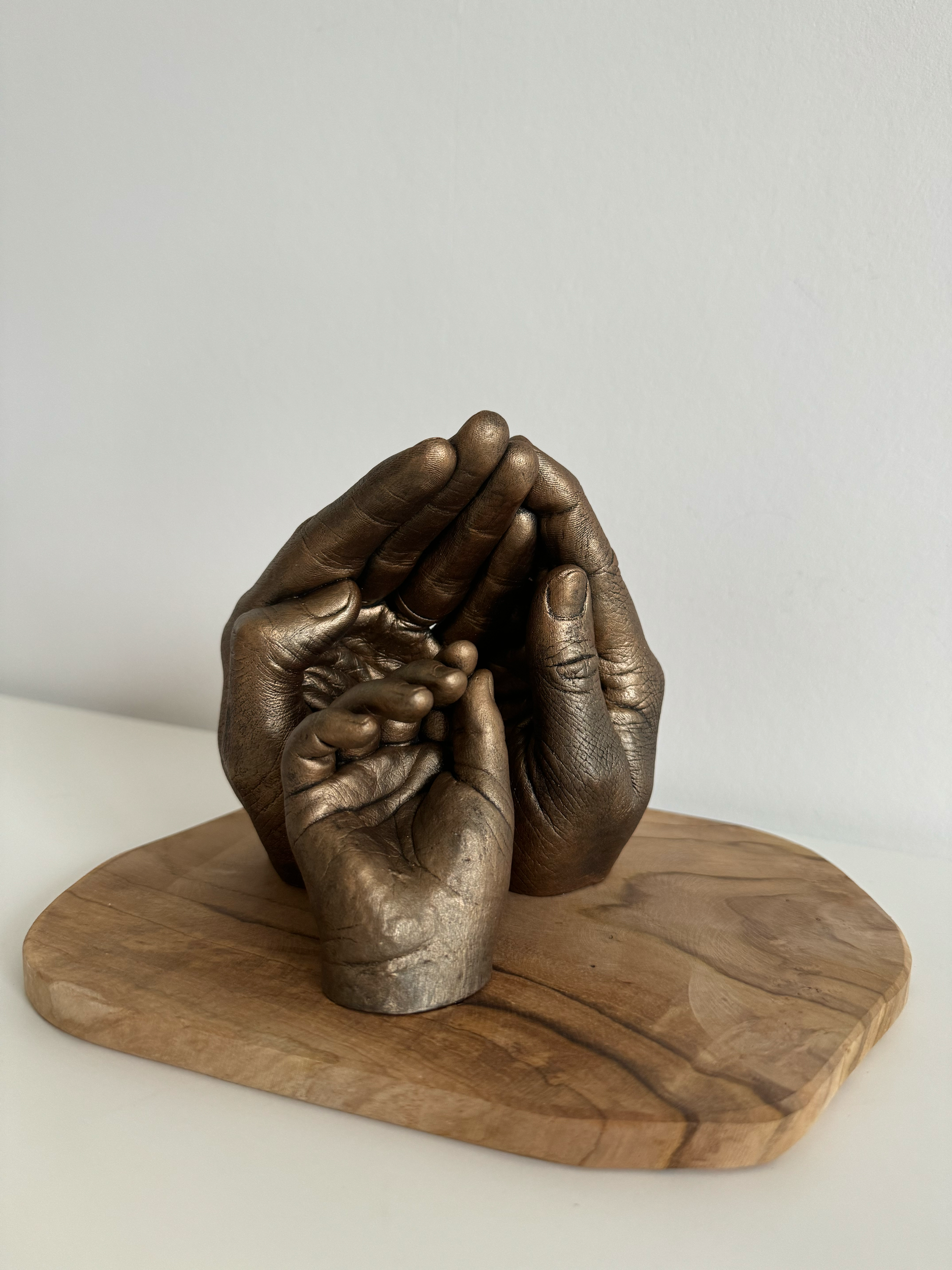 Gezins afdruk van mama papa en dochter