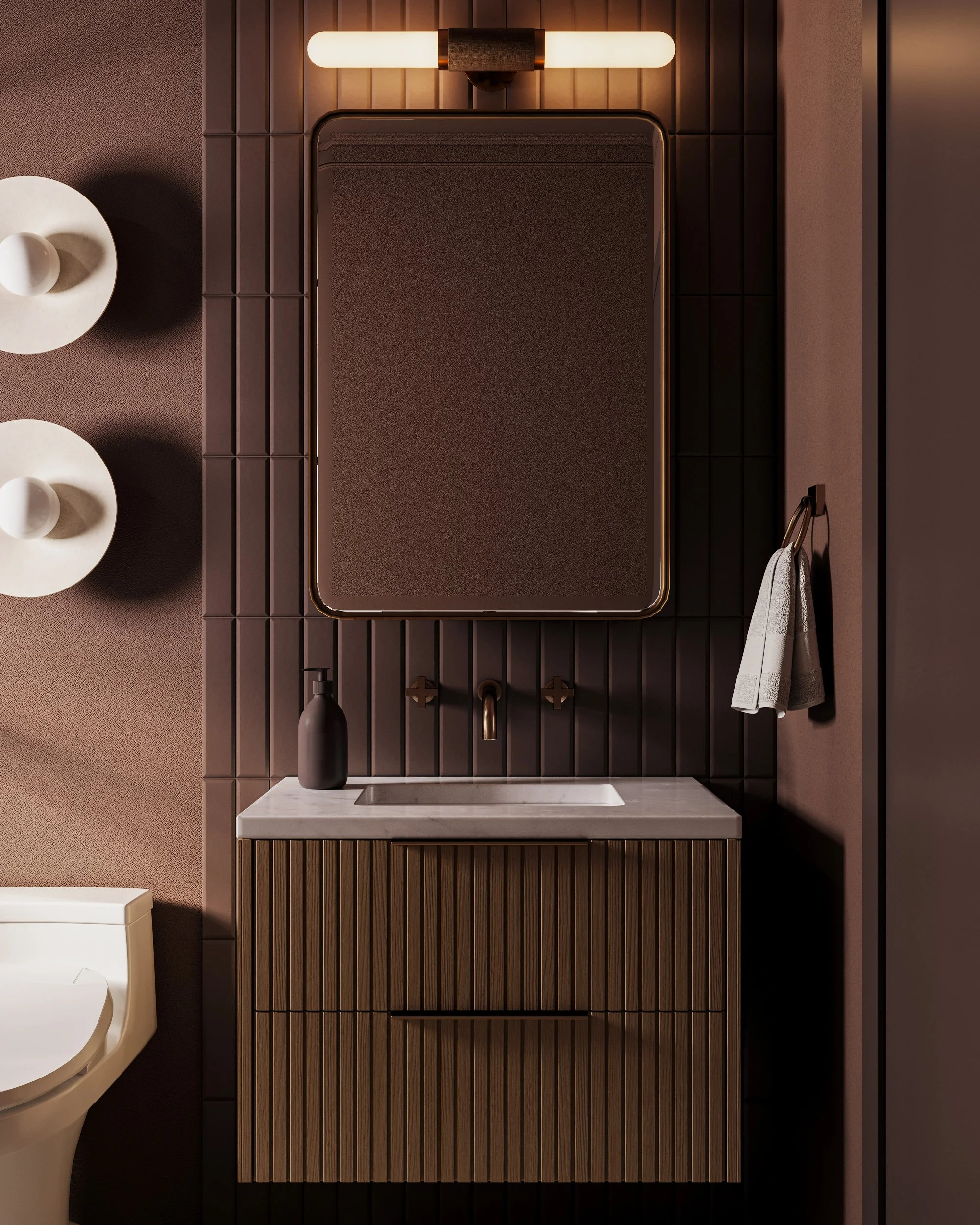 Cozy dark powder room with deep wall color, light basin and warm brass fixtures
