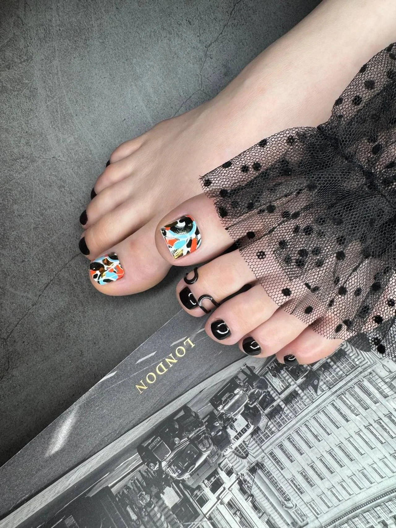 Black Russian Pedicure with nail art at Mars Nails NYC