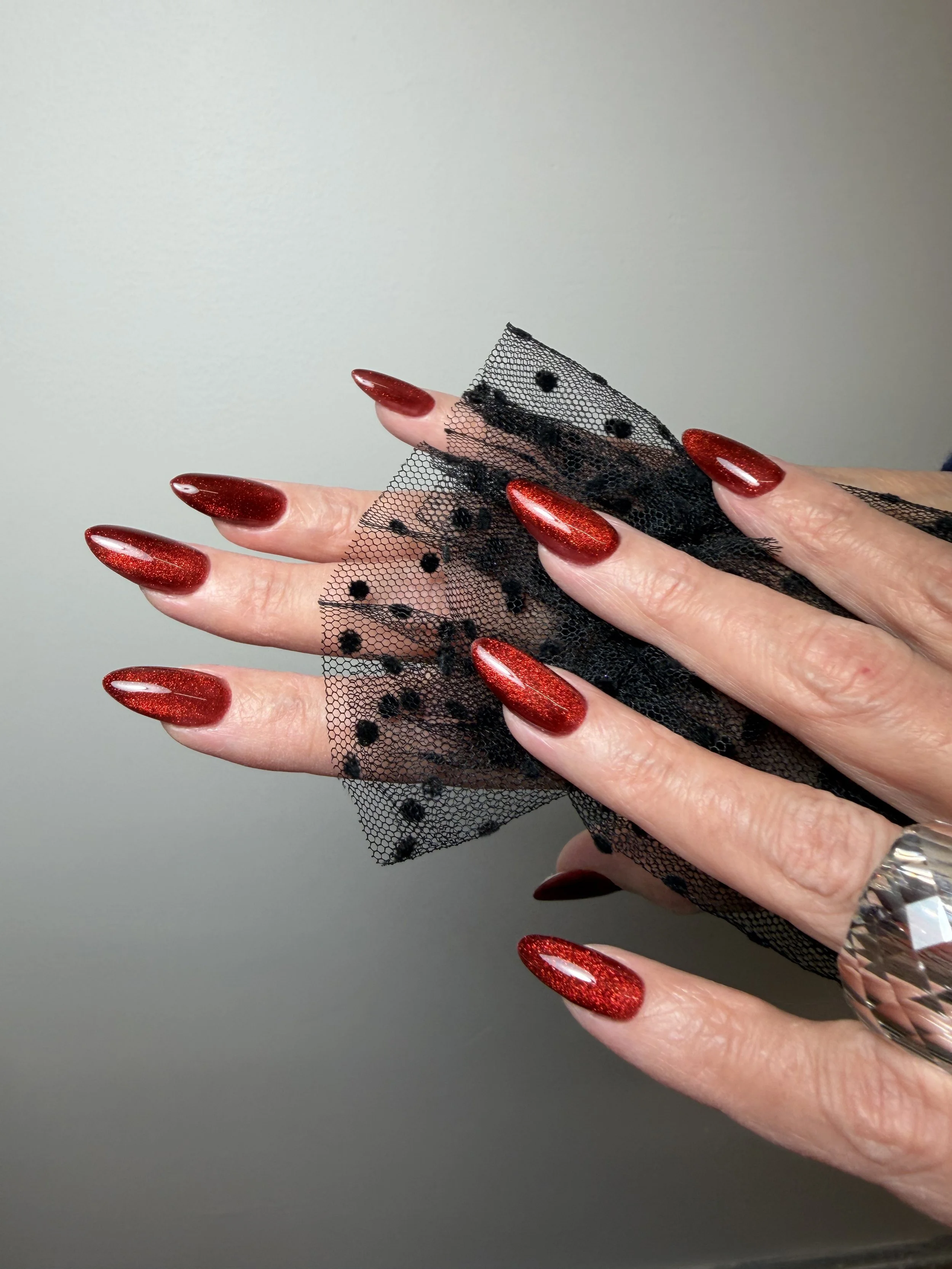 Builder gel manicure with cat eye nailes design