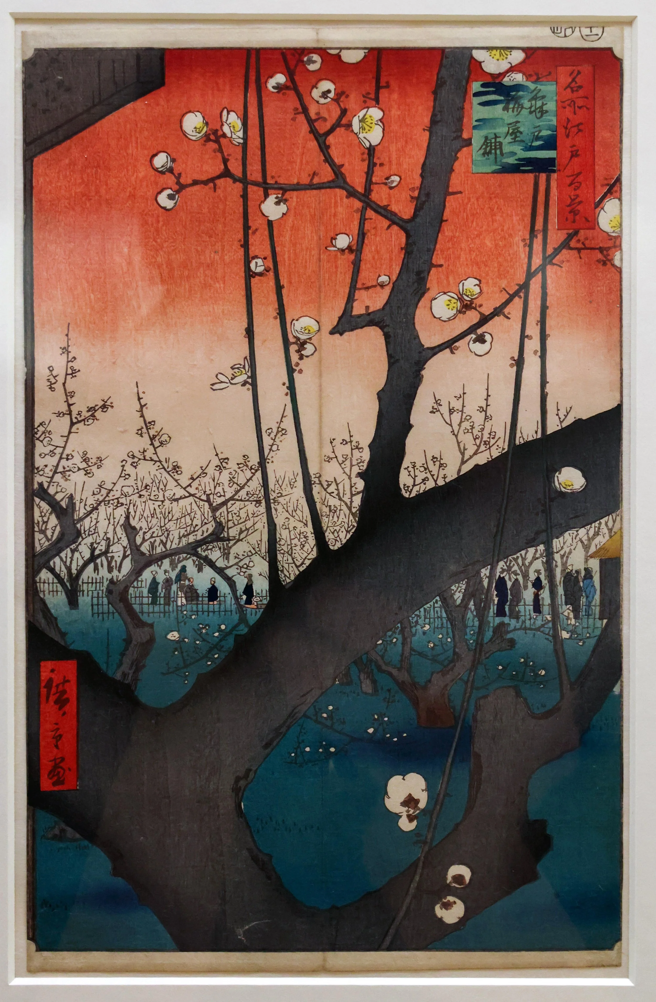Japanese painting of a plum tree with blooming white flowers, set against a red and blue background, with small human figures at the bottom.