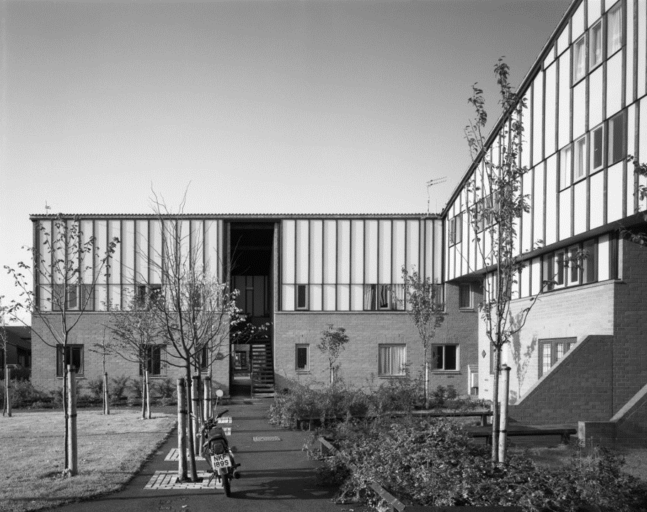 View of the side wings to the courts.
Walk-up stacked flats.