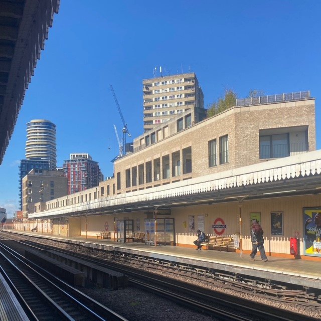 View of  Haworth Tompkins' Silchester Estate development from the platforms of Latimer Road's Underground Station. This new mixed-income project incorporated a 1960 era high-rise public housing tower as part of an urban repair development that recrea